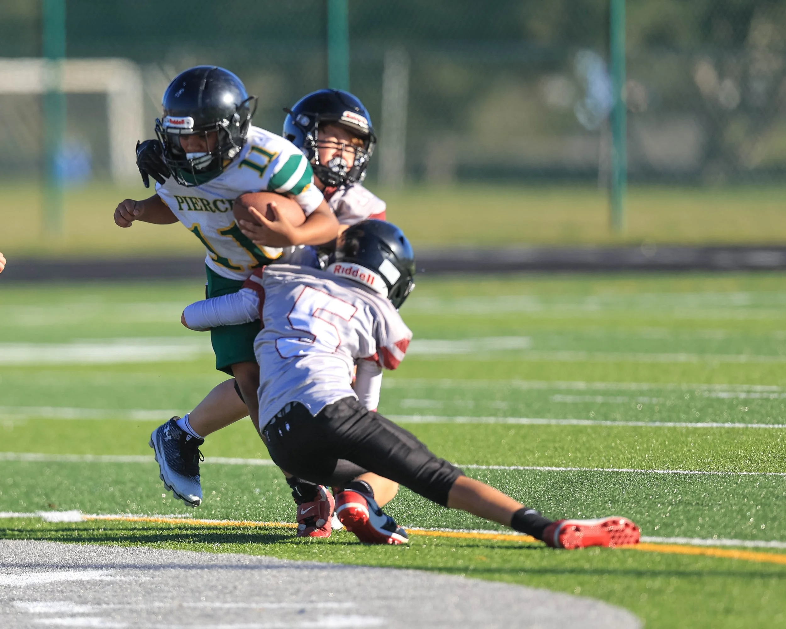 Pierce #11 tackled by Mason #5