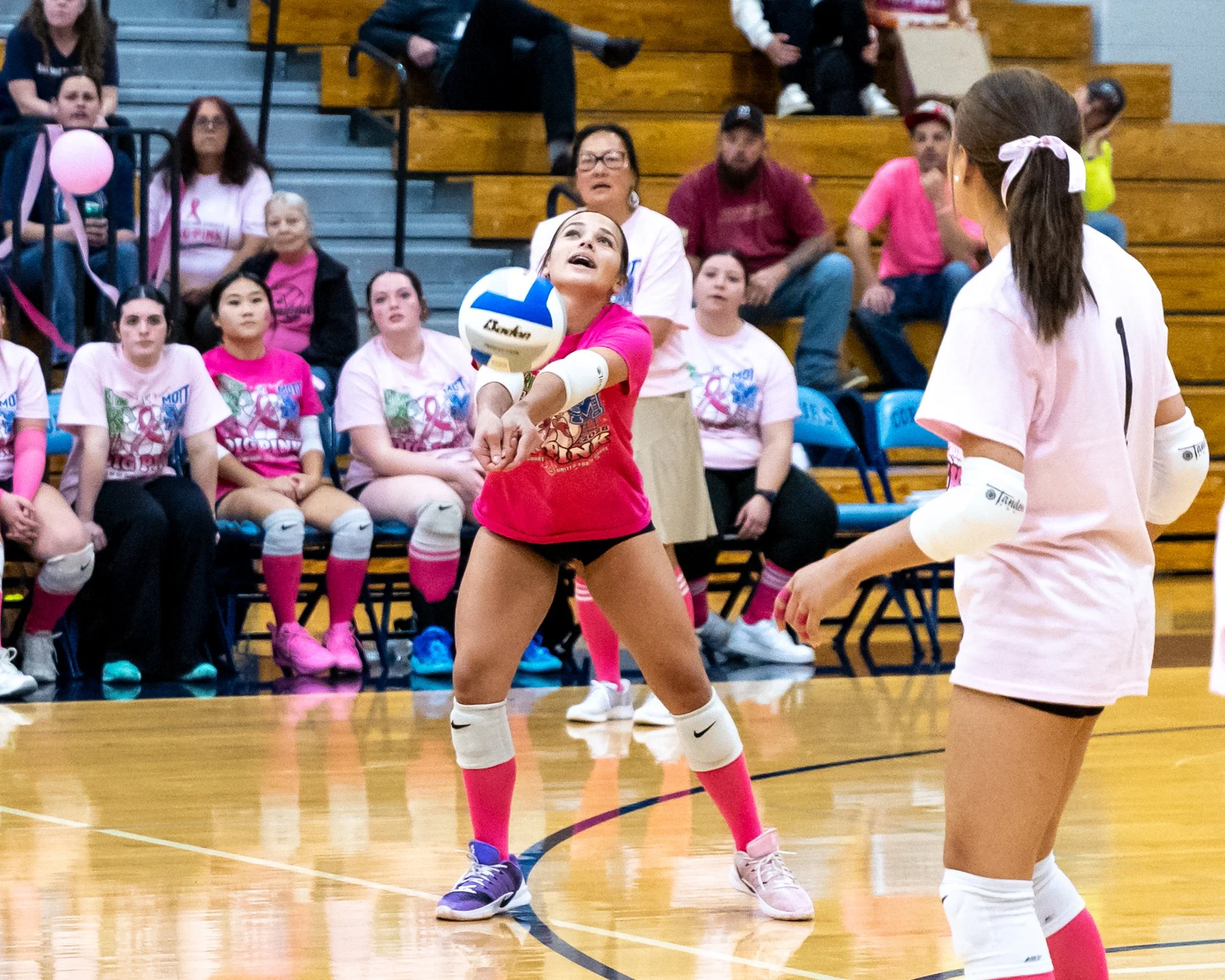 Mott player hits the ball