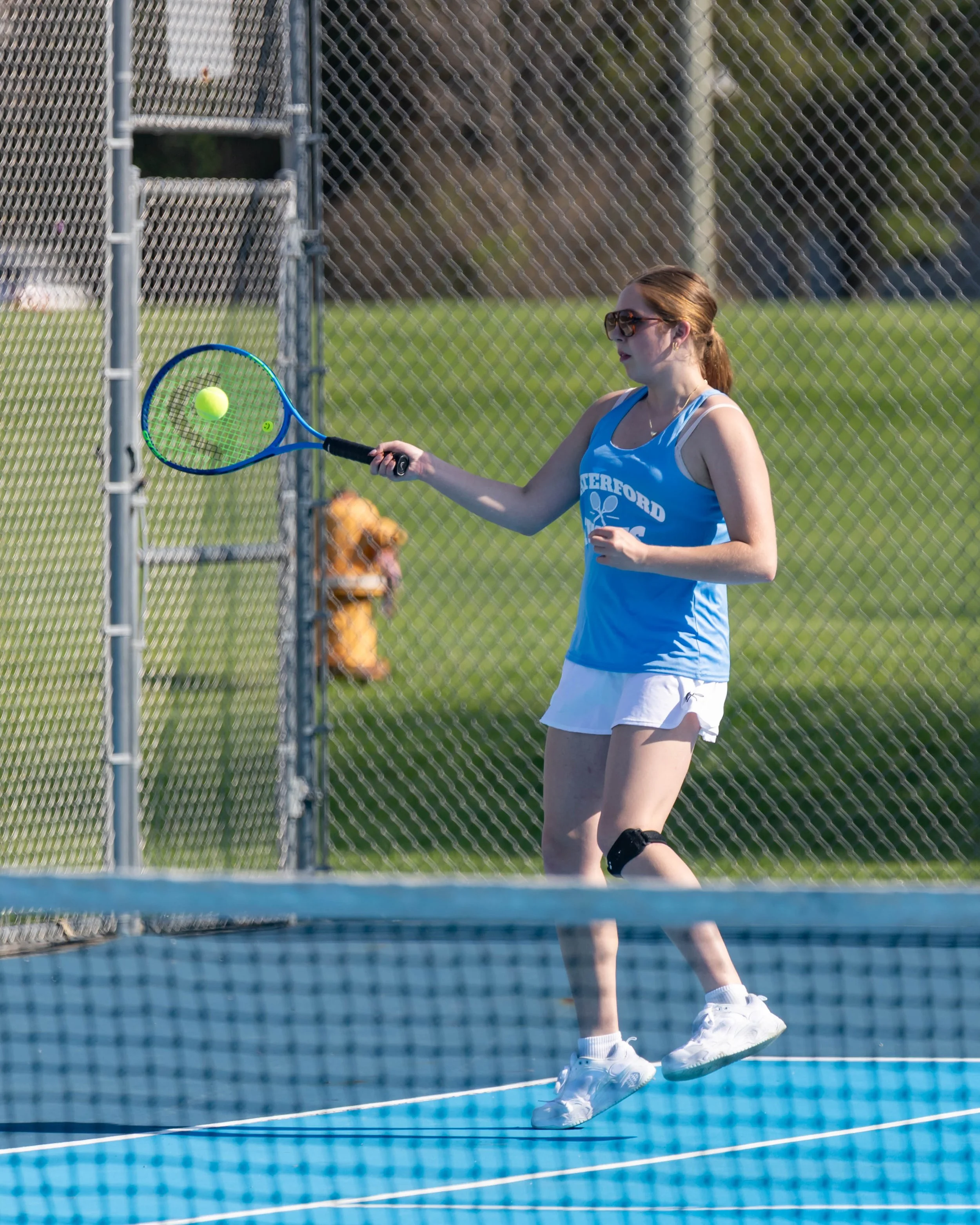 Waterford United player returns the ball