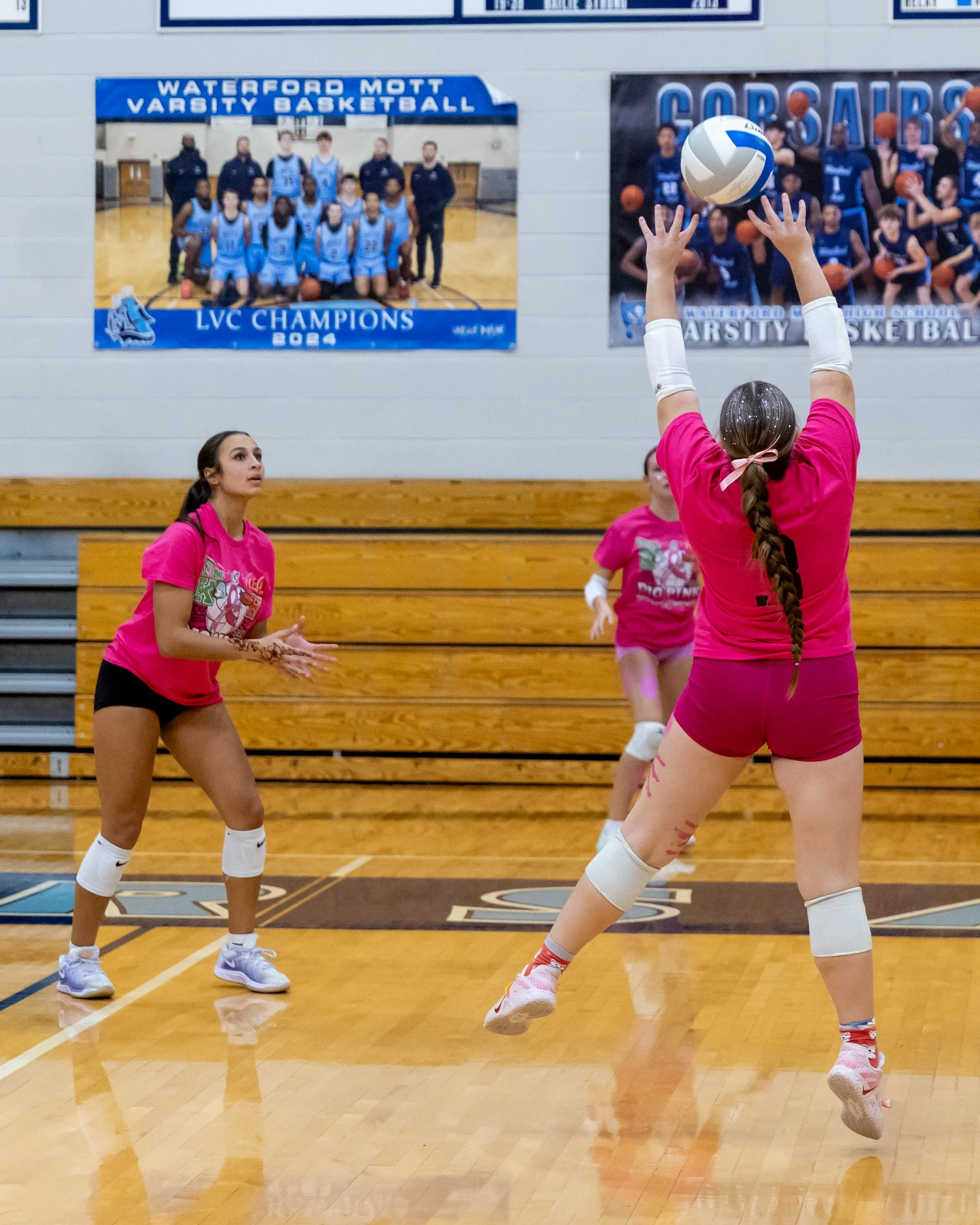 Kettering player hits the ball