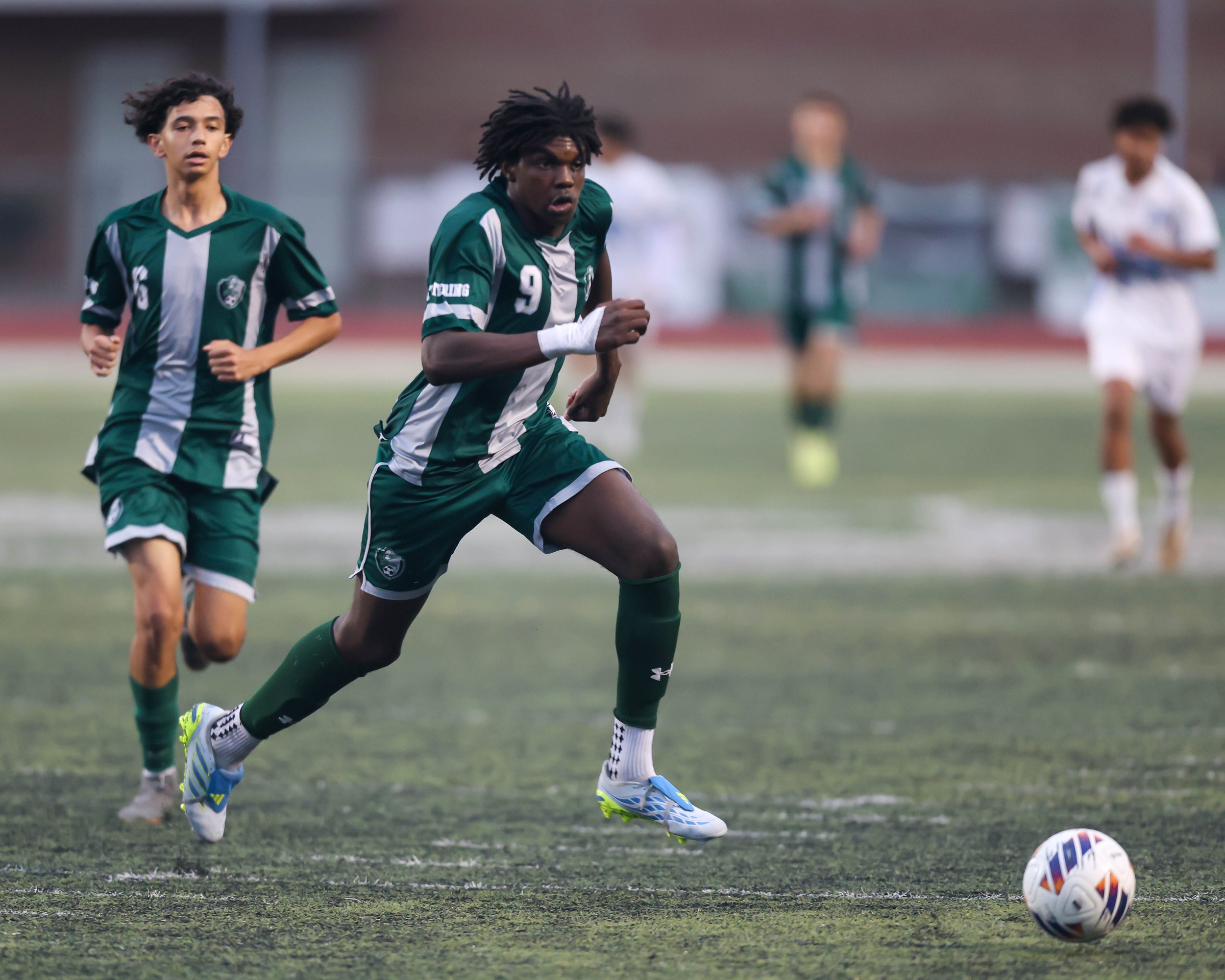 WK # 9 chases the ball