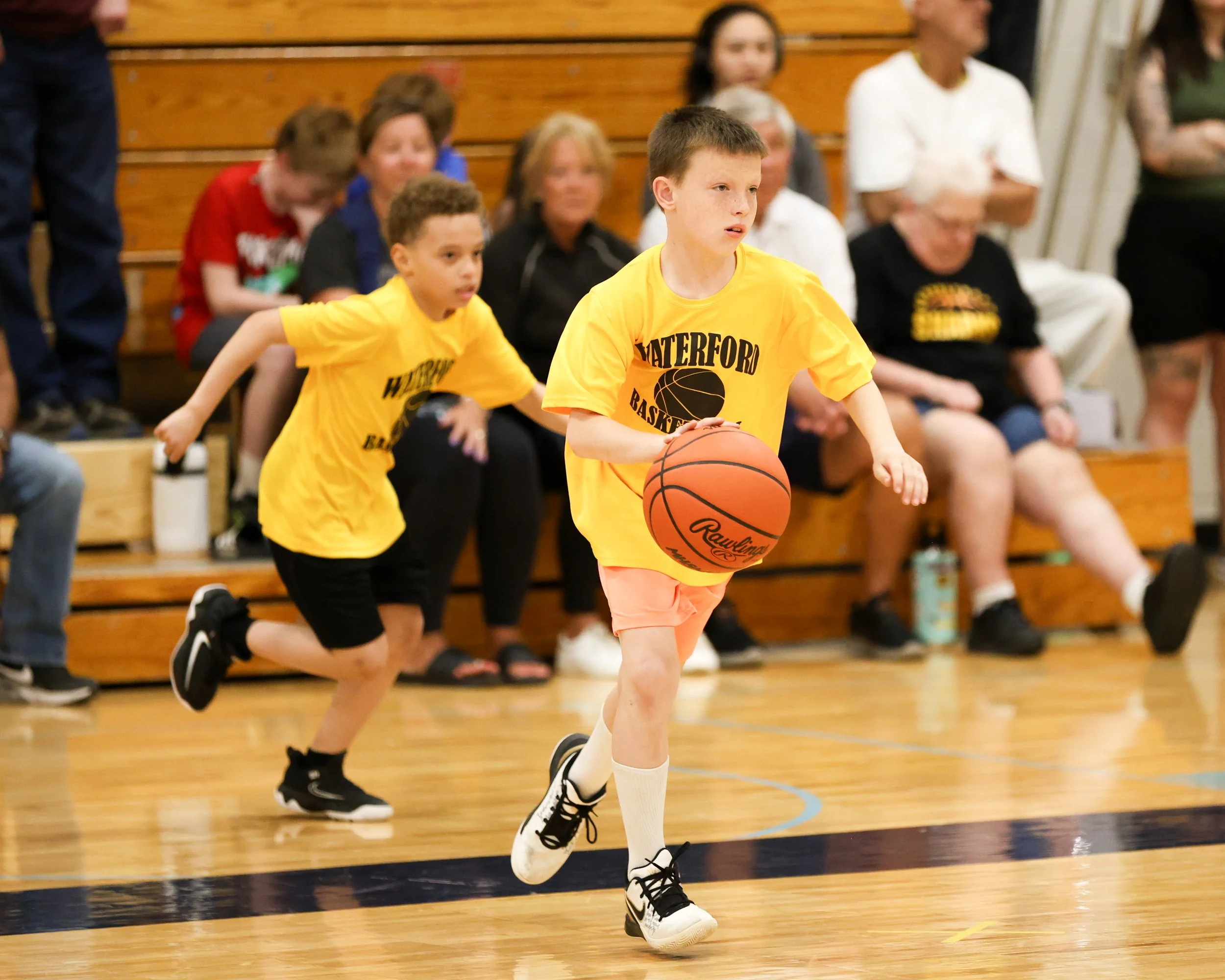 Schoolcraft boy driibbles the ball