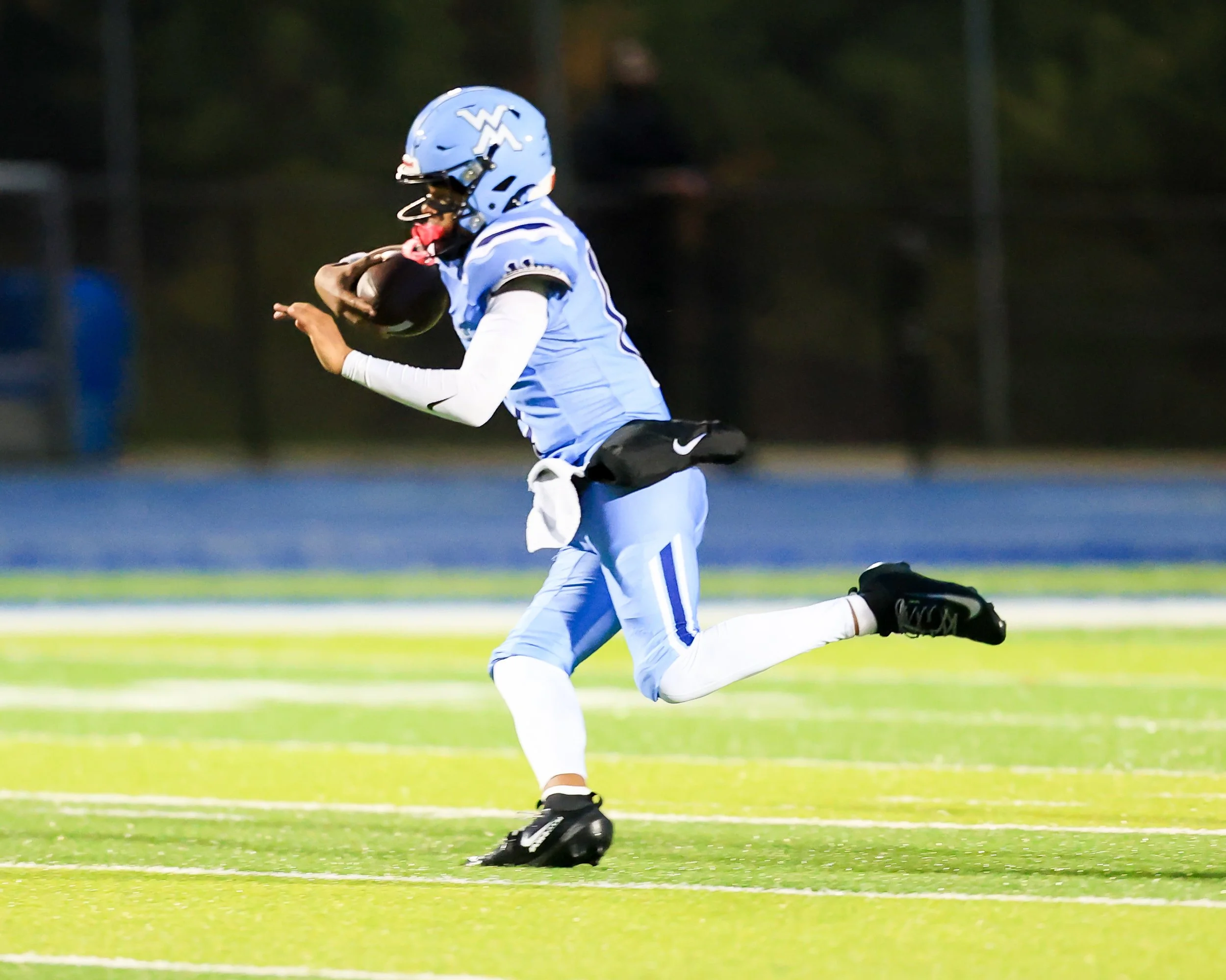 Mott #11 runs with the ball
