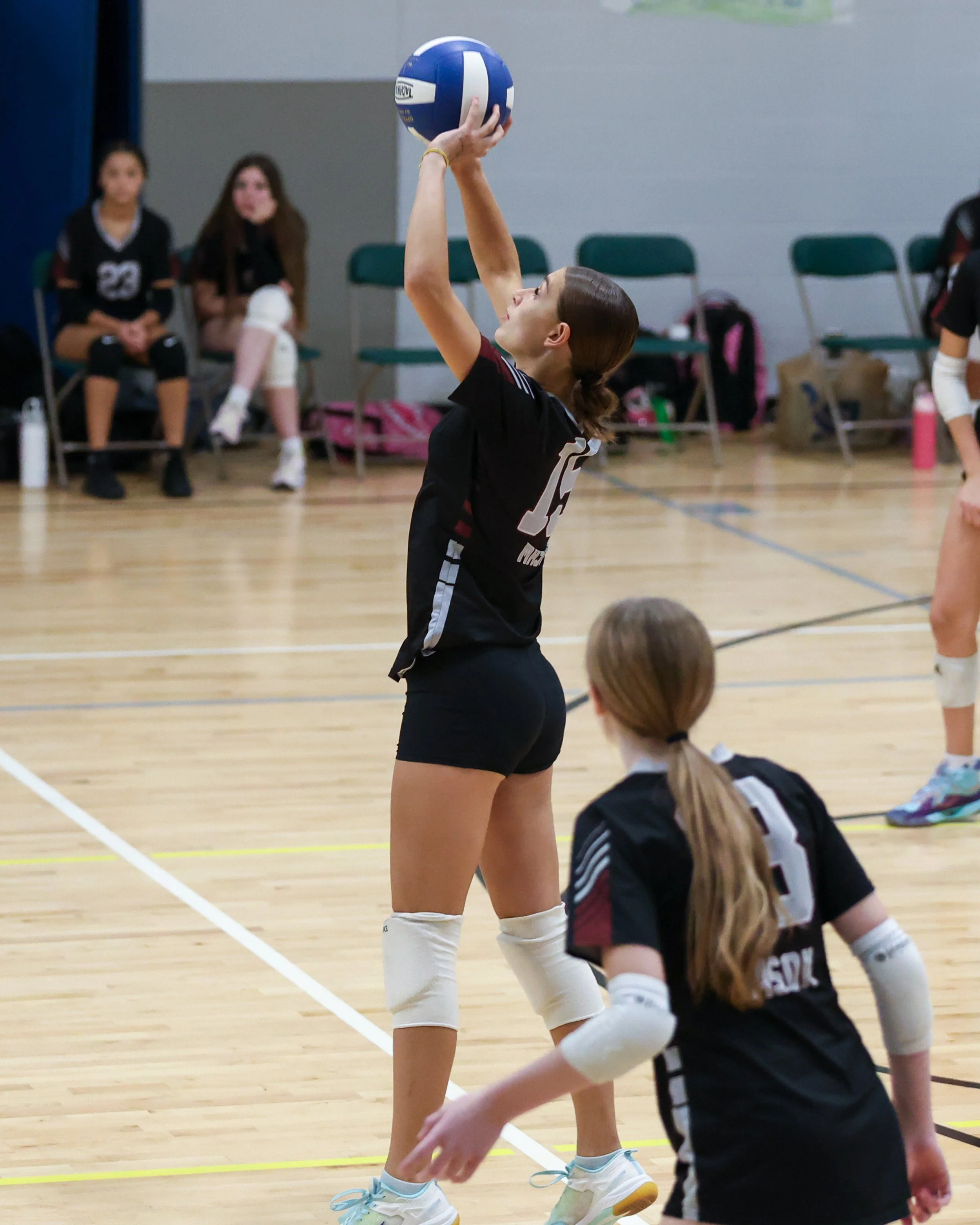 Mason girl returns the ball