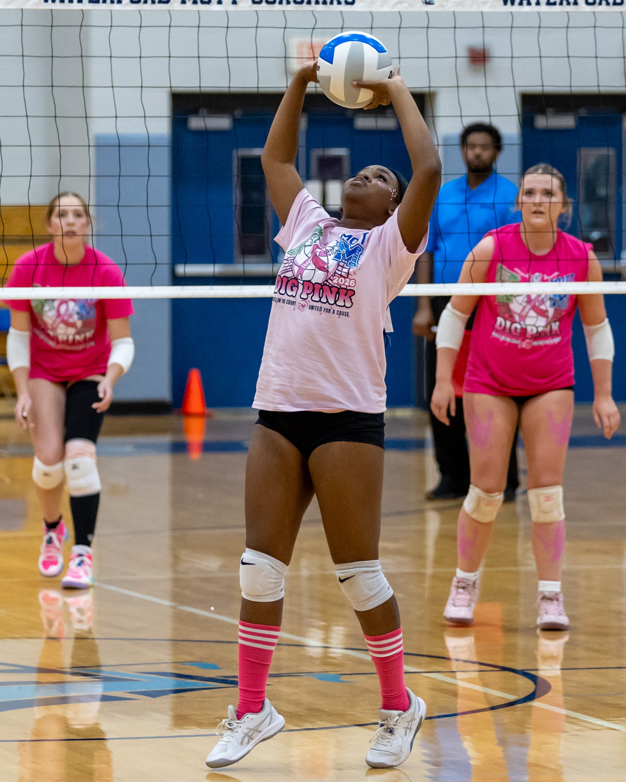 Mott player sets the ball