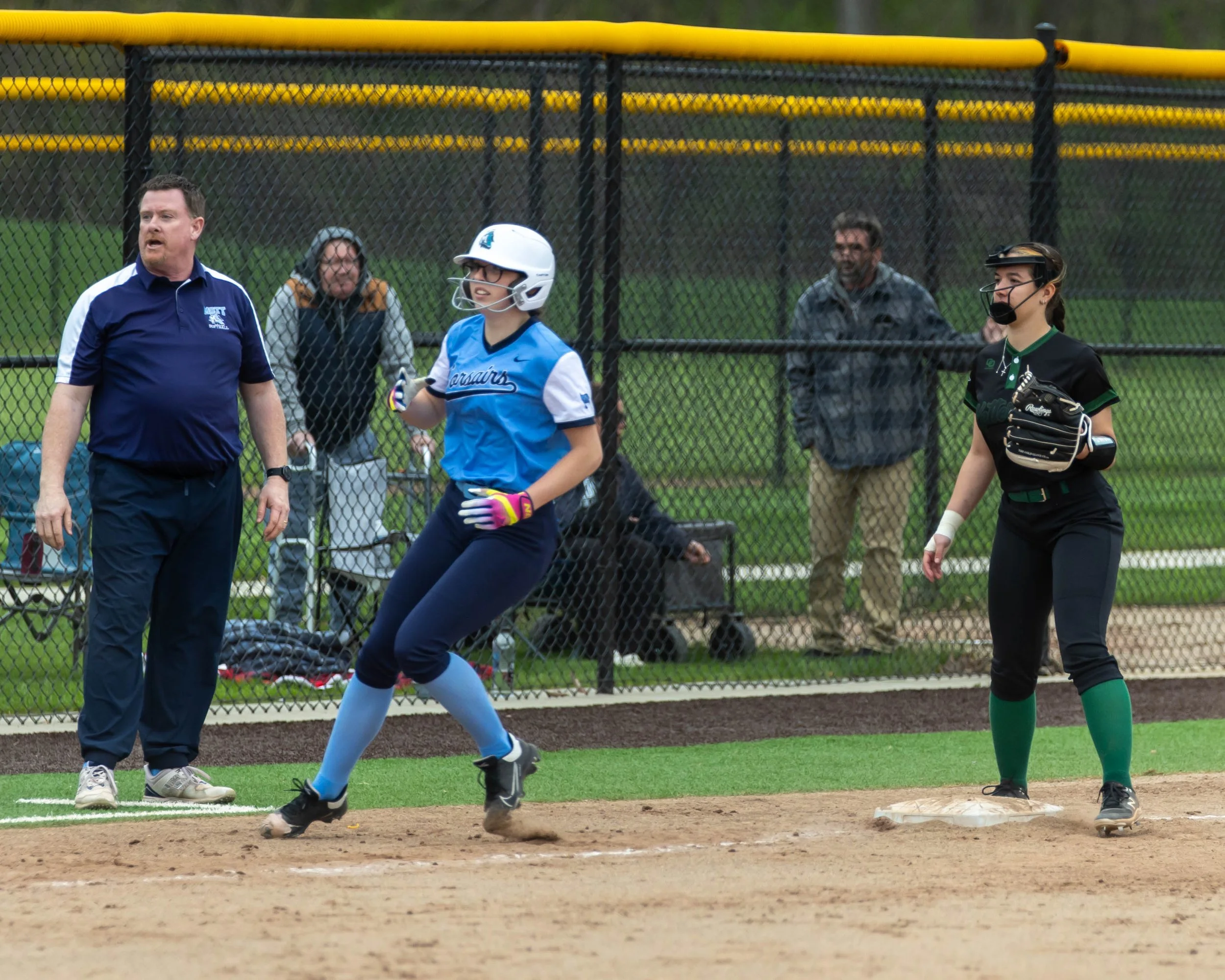 Mott runner rounds third base