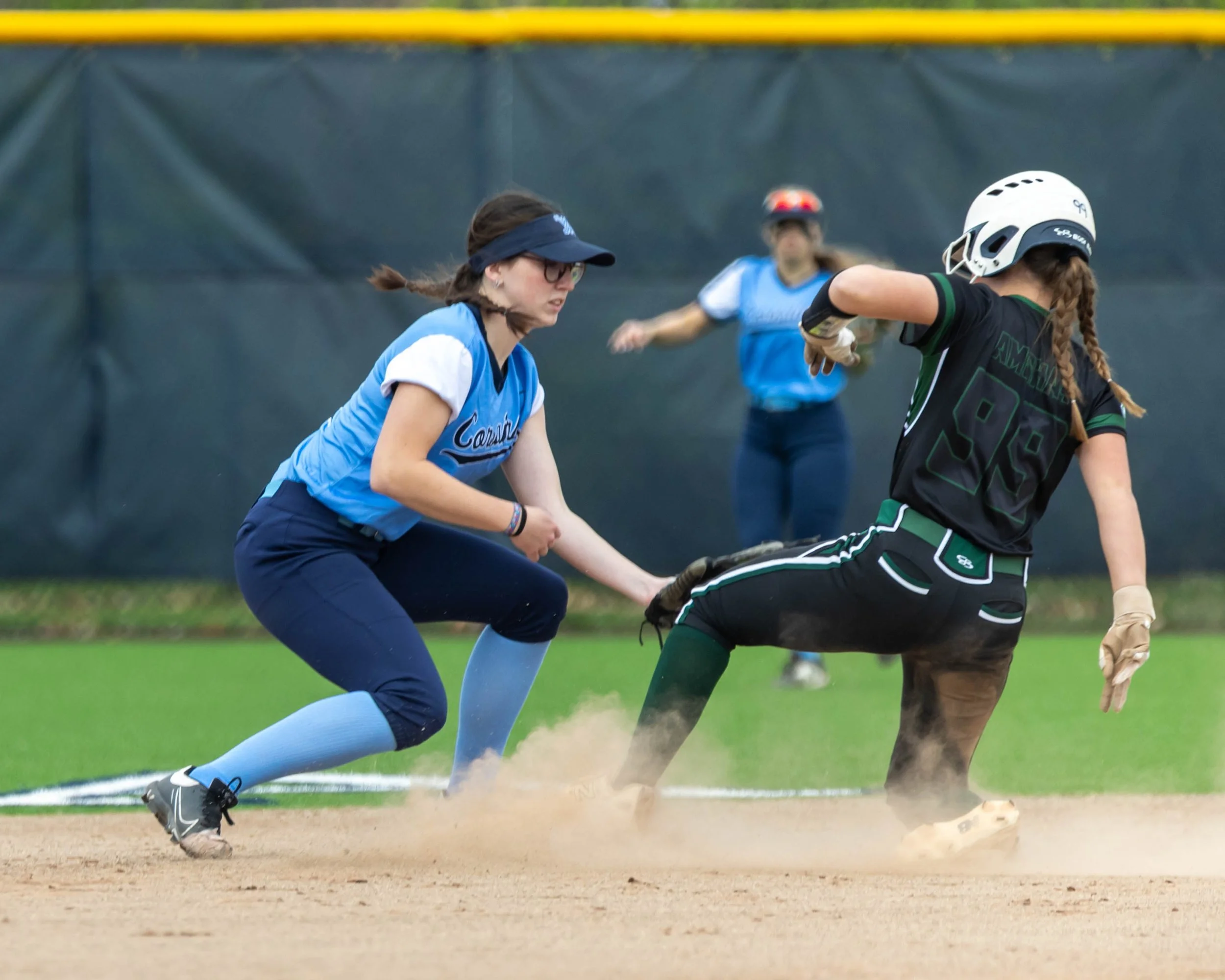 Mott shortstop tags the Kettering base runner at second base