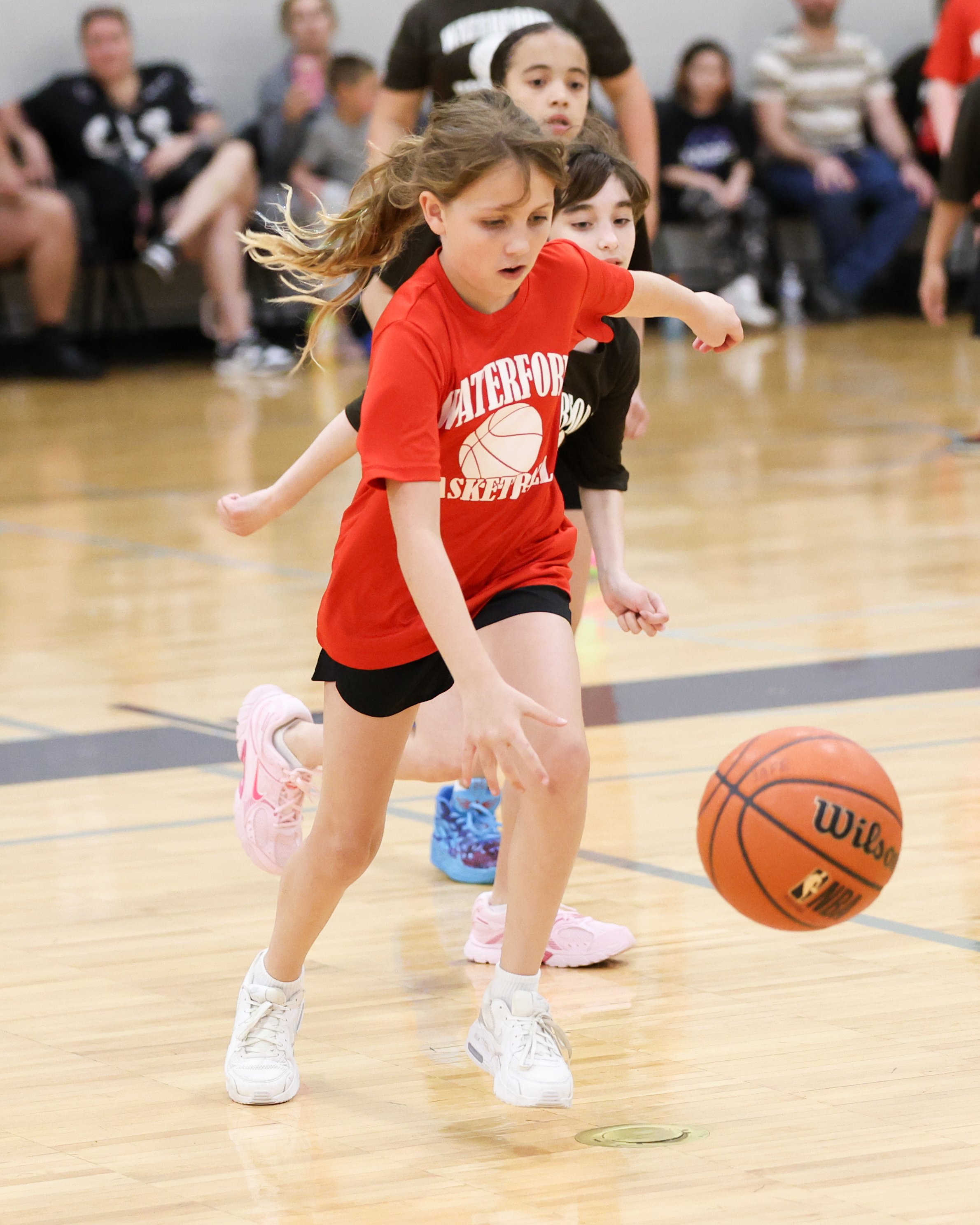 Houghton girl dribbles the ball