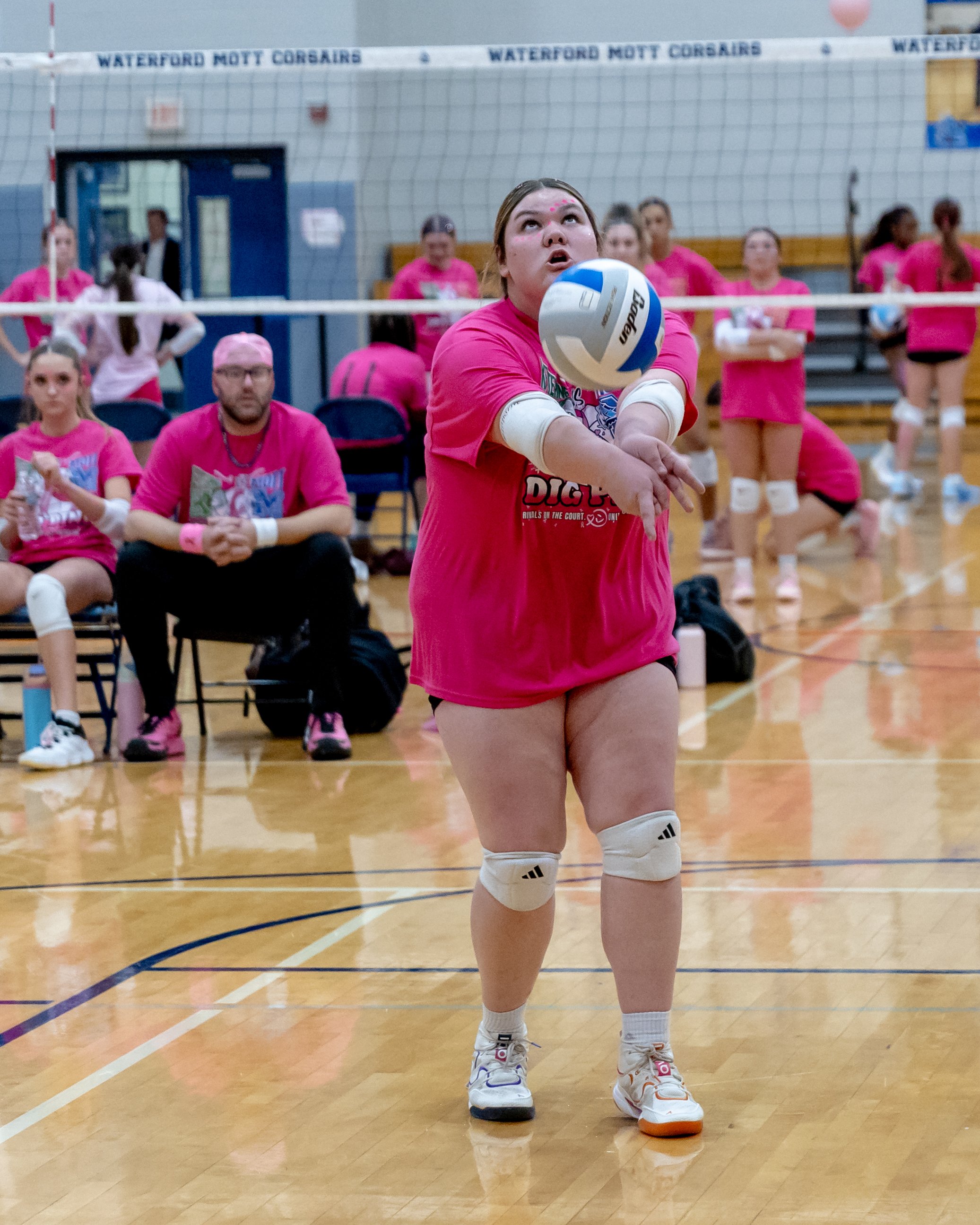 Kettering player hits the ball