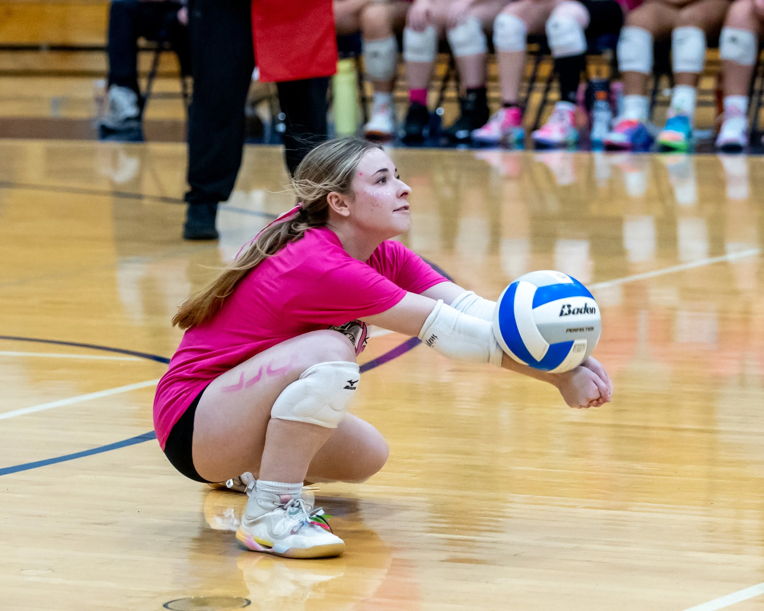 Kettering player hits the ball