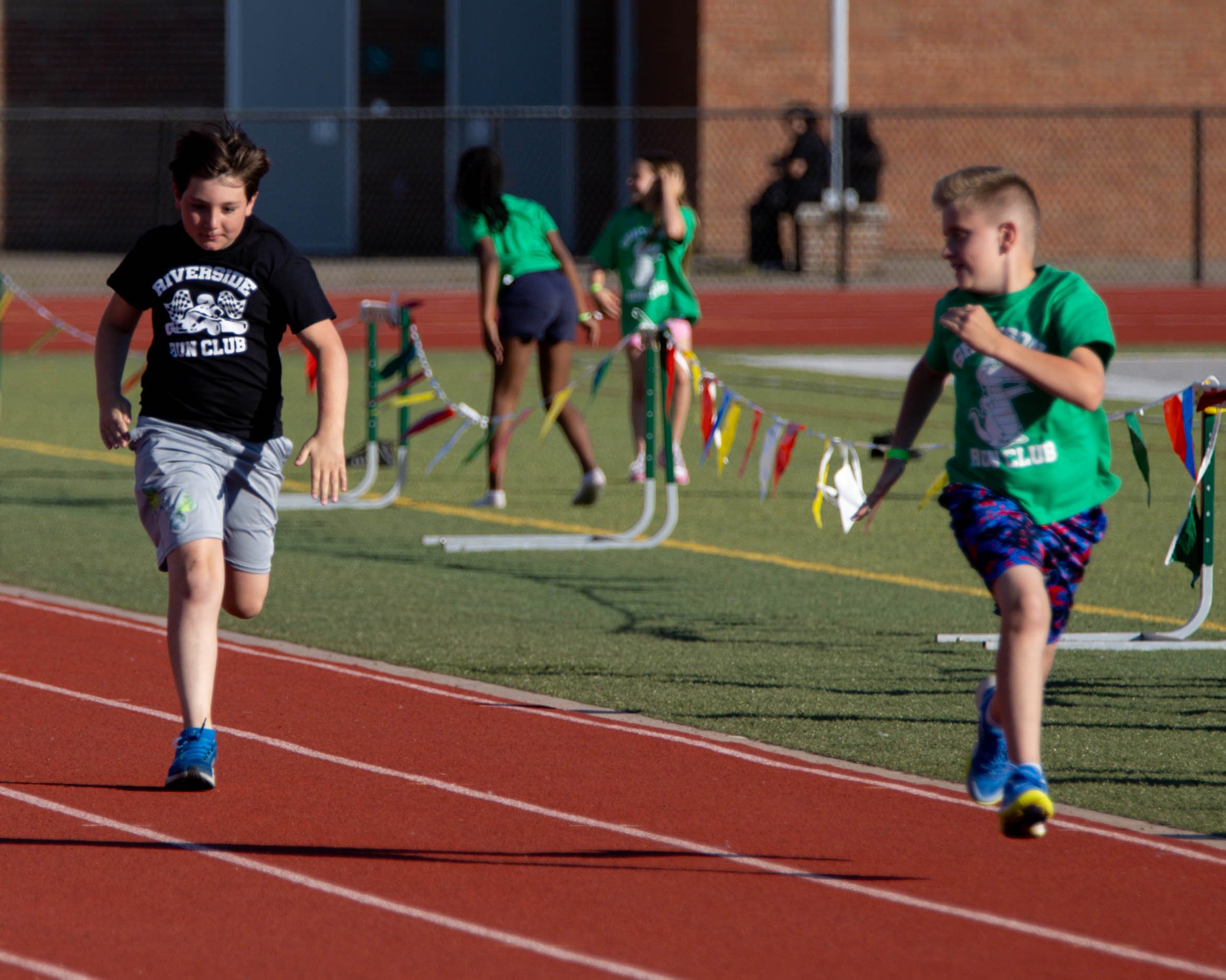 Grayson and Riverside boys finish the race