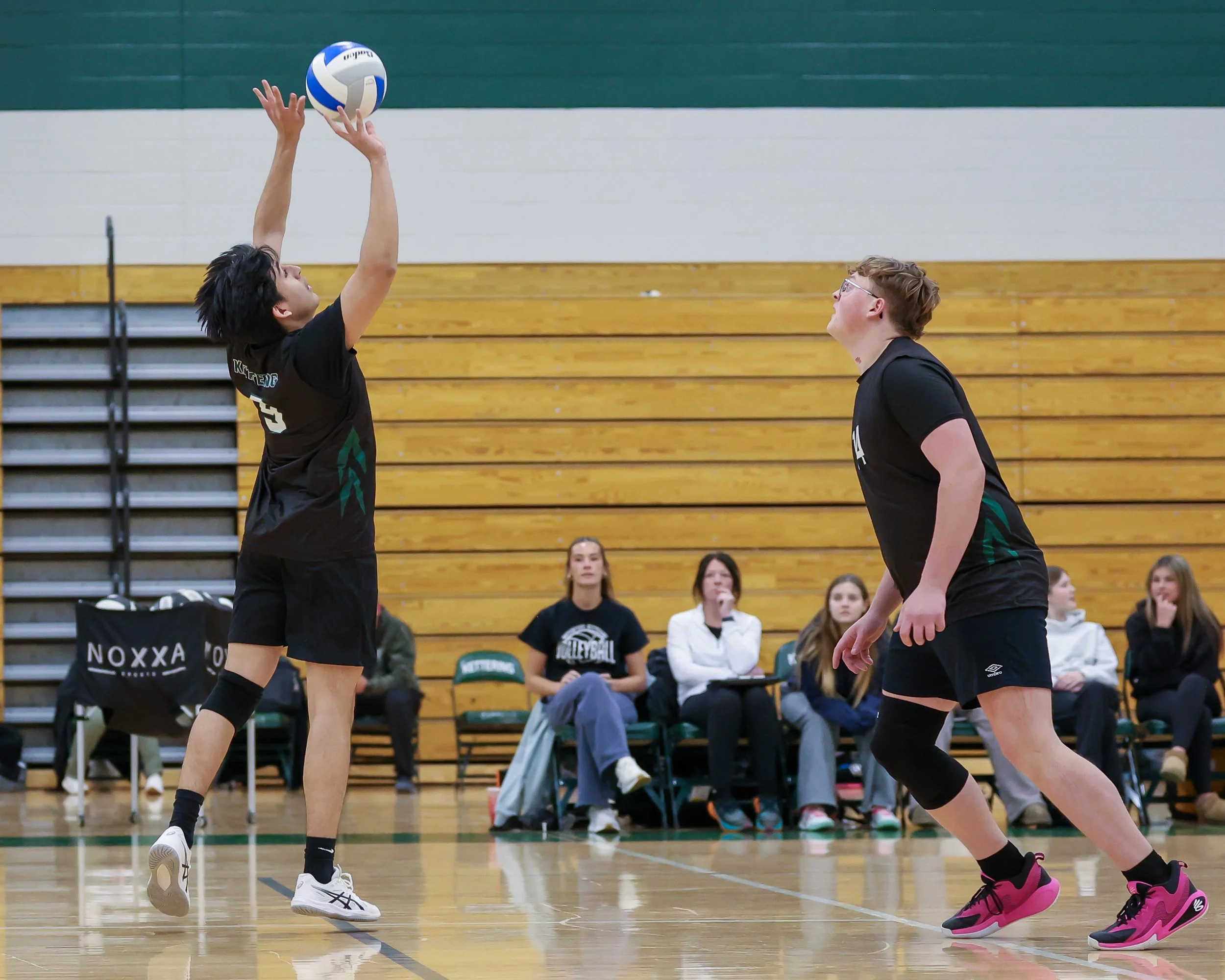 #9 sets the ball for #14