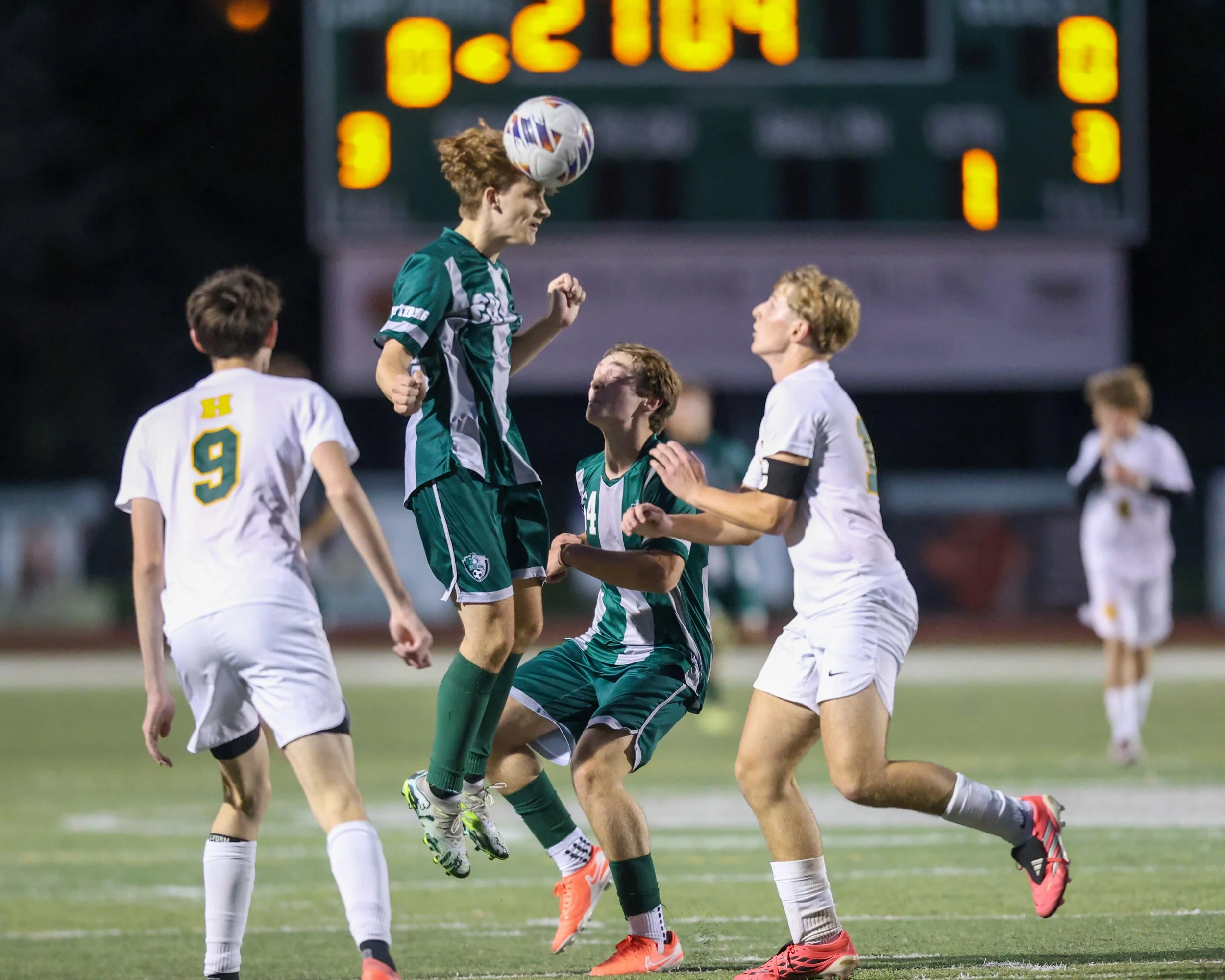 WK #28 heads the ball