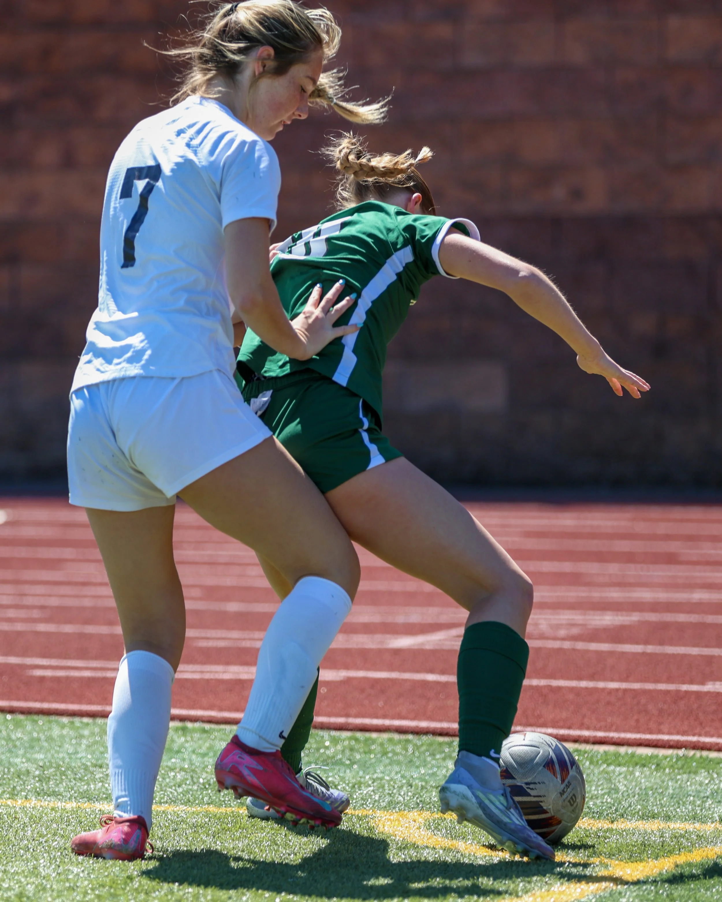 #10 controls the ball in front of Stoney Creek 17