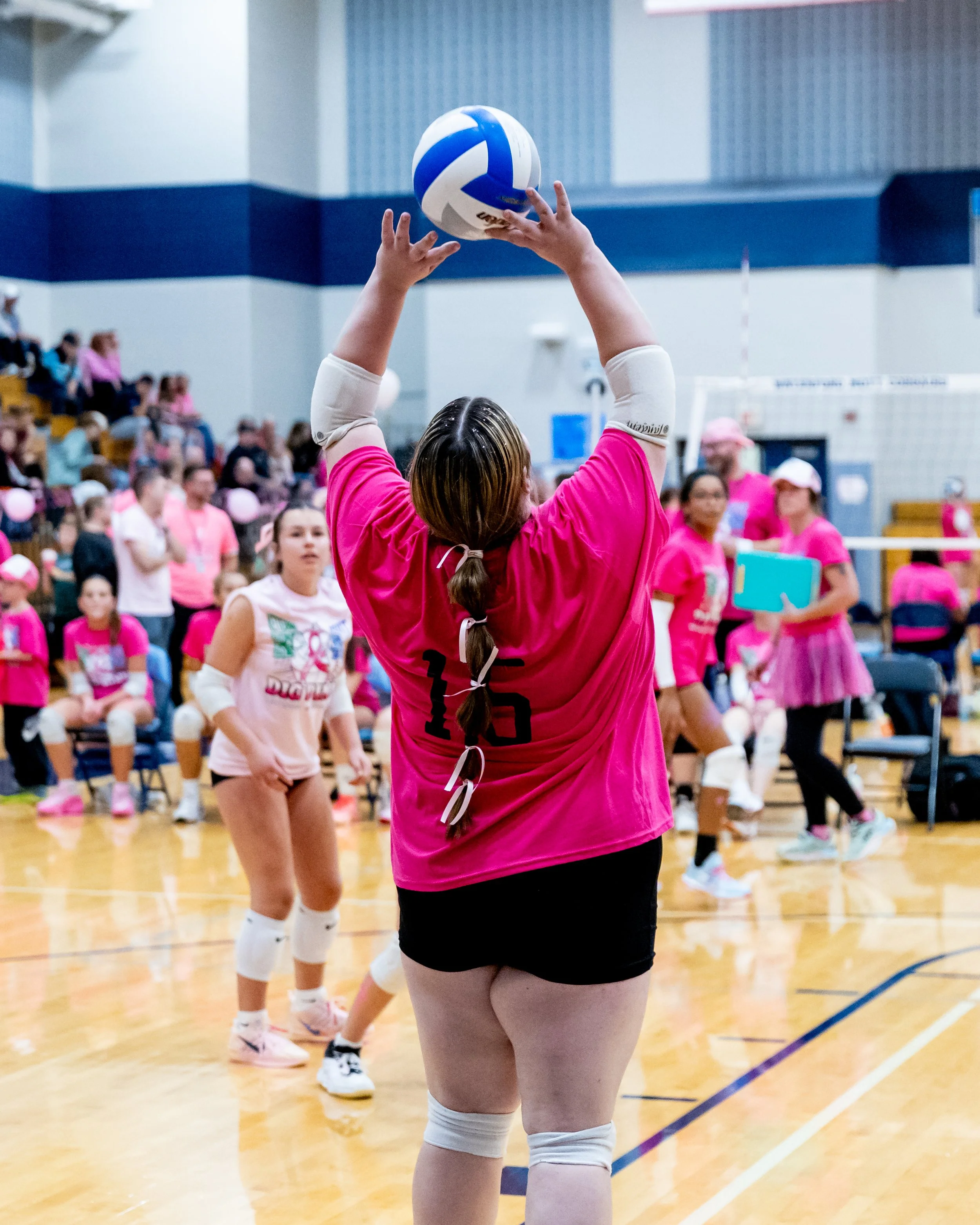 Kettering Player hits the ball