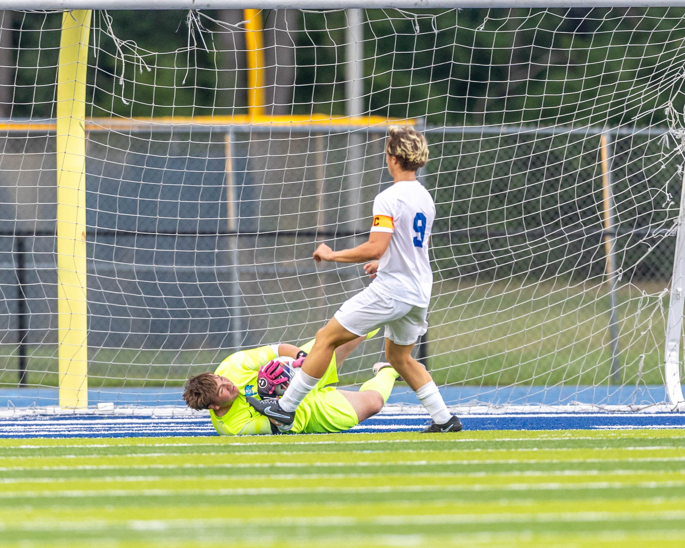 WM goalie saves the ball