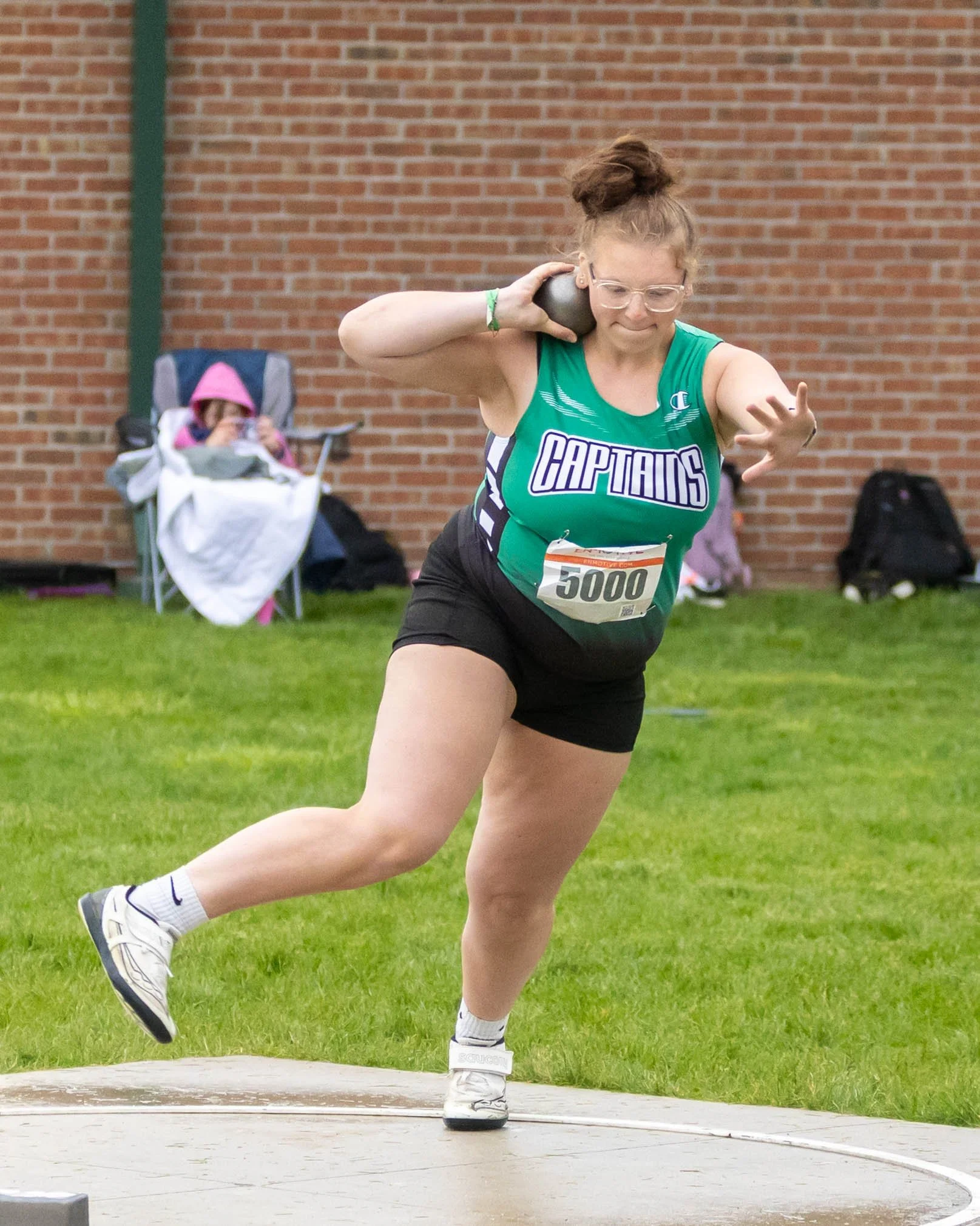 Kettering #5000 starts to throw the shot put