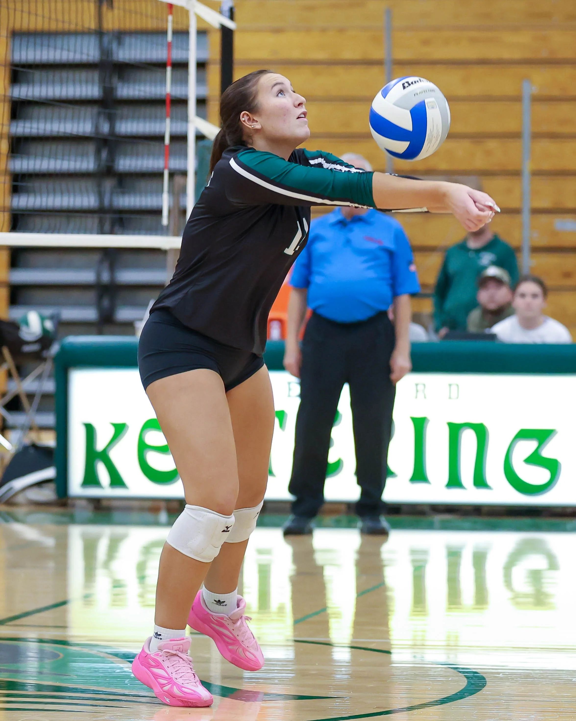Kettering player hits the ball