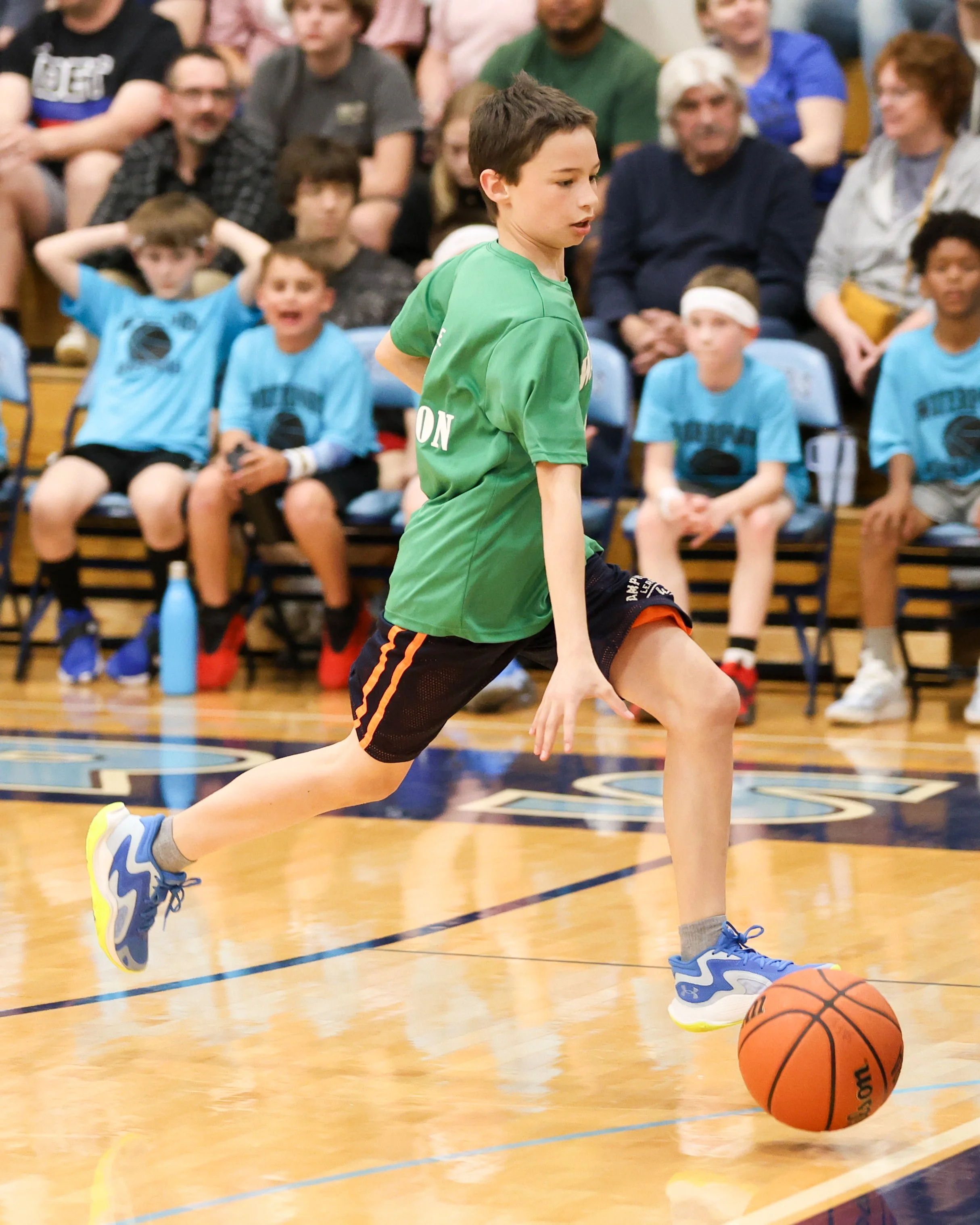 Grayson boy dribbles the ball 