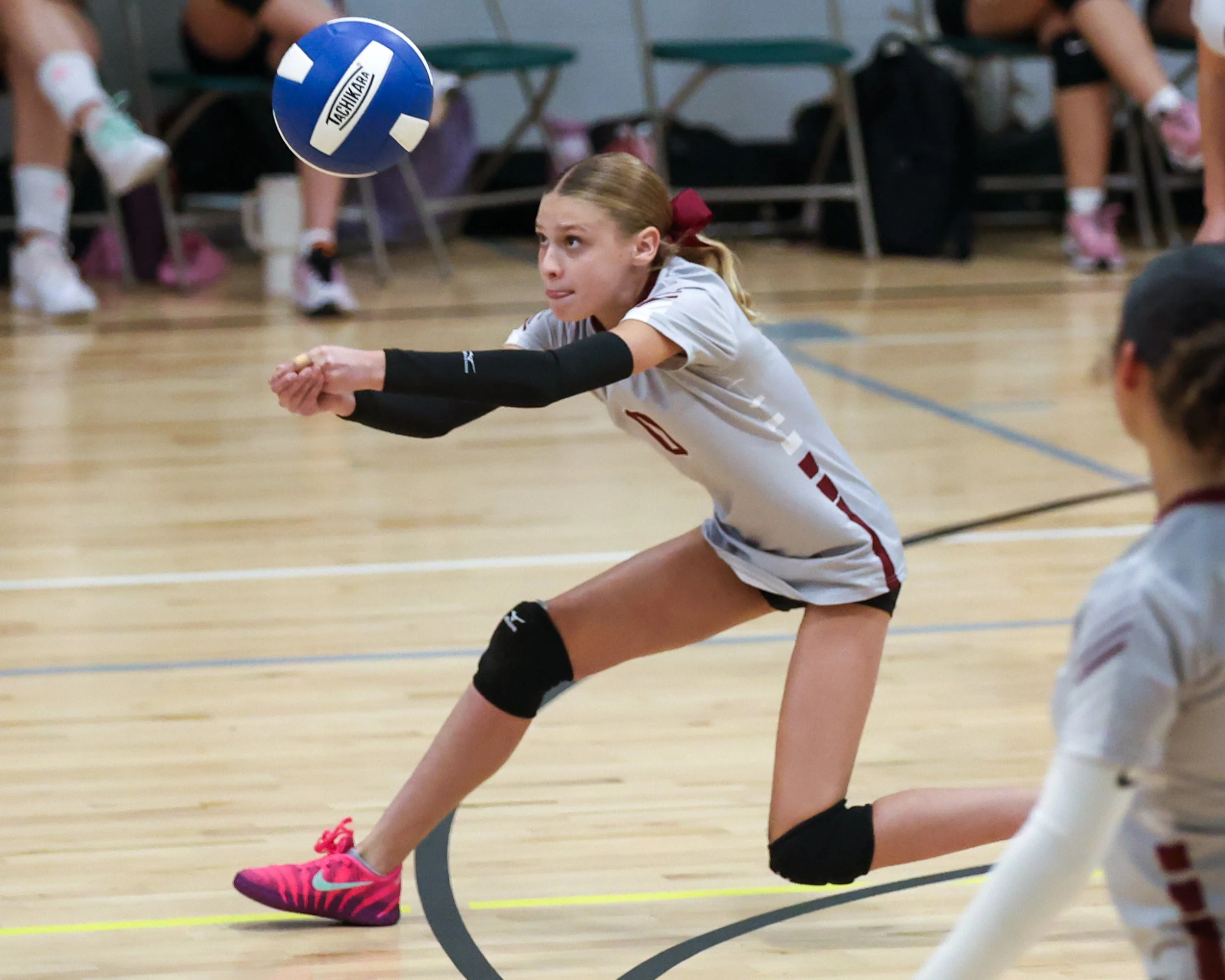 Mason girl returns the ball