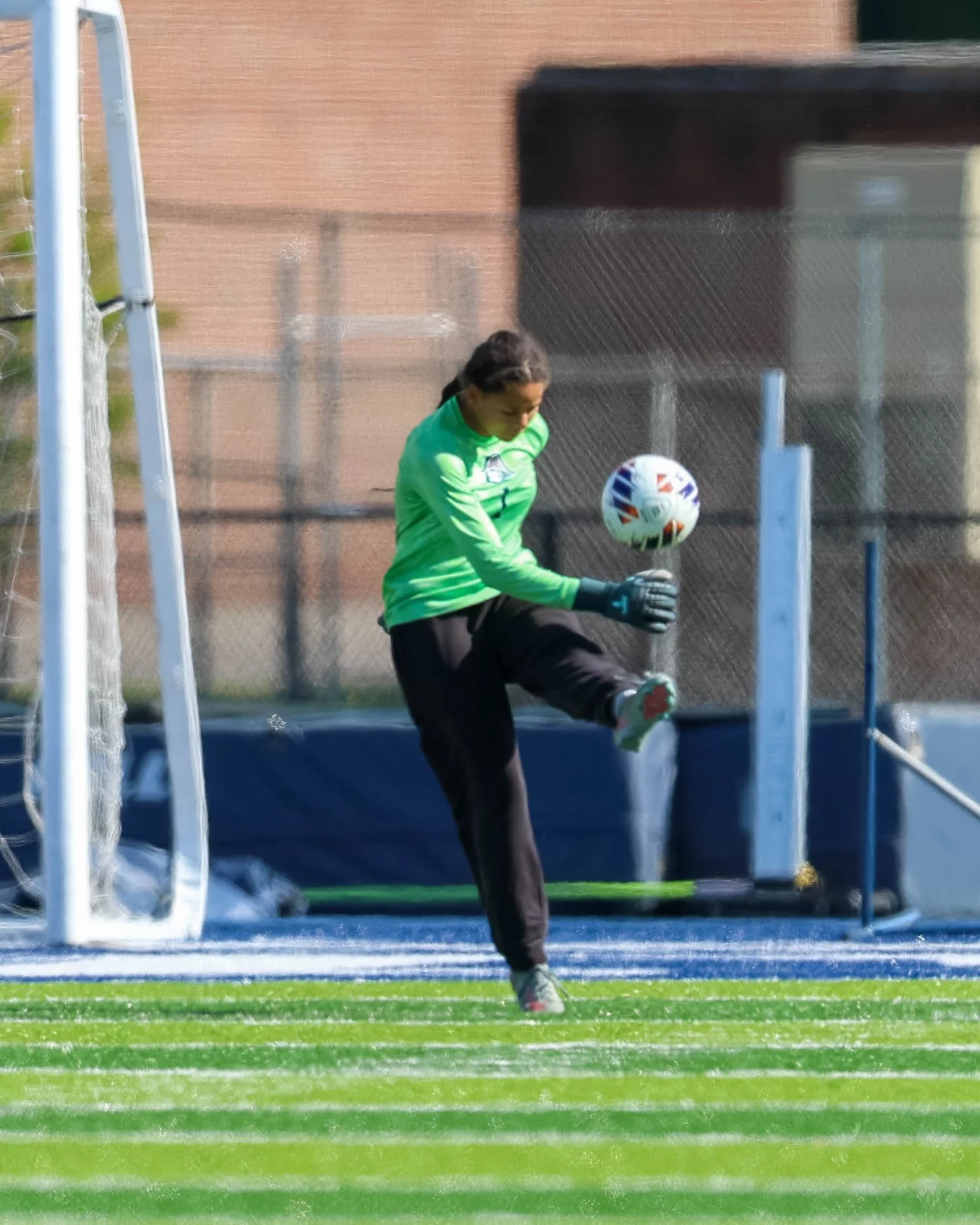 #1 kicks the ball