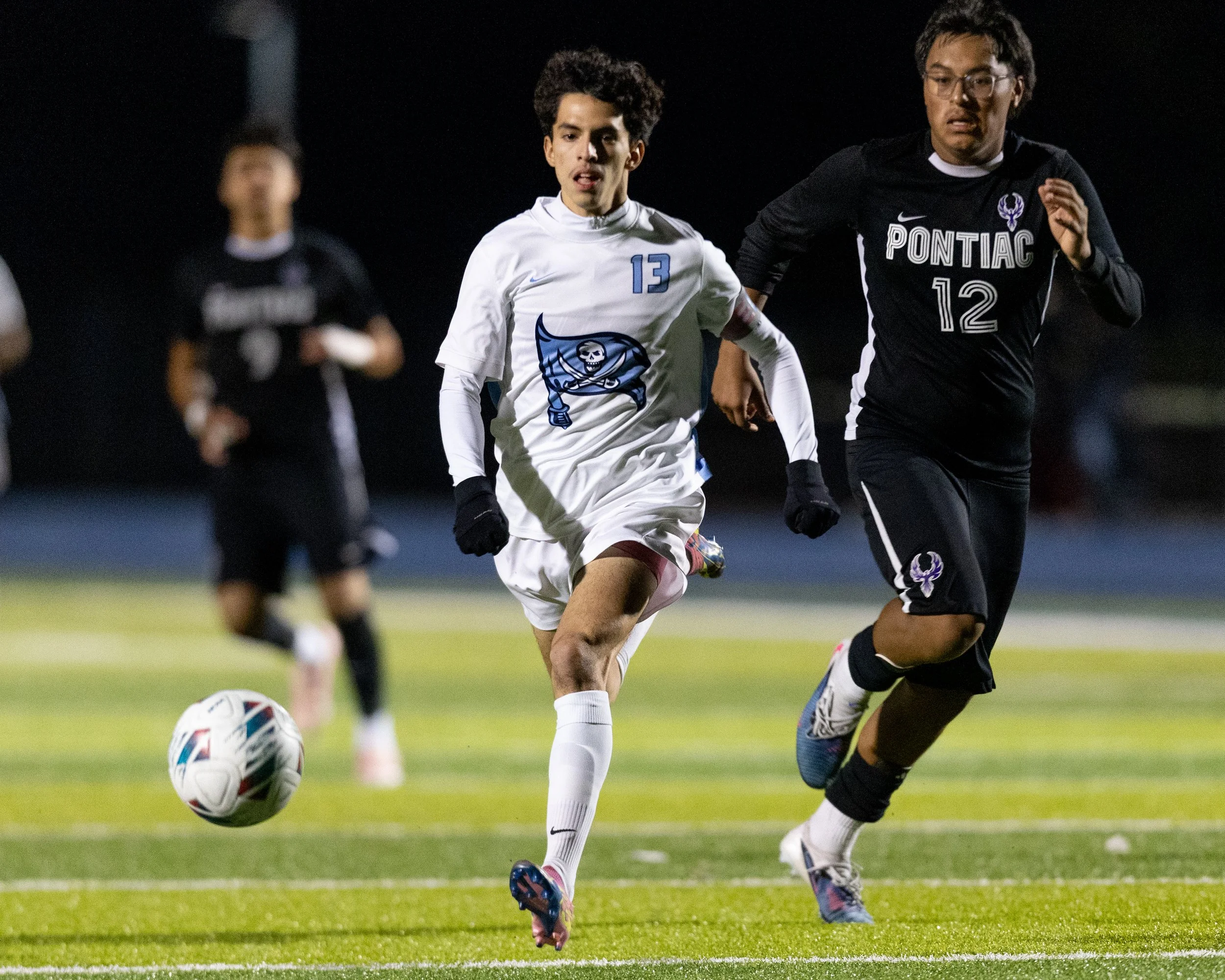 WM #13 chases down the ball