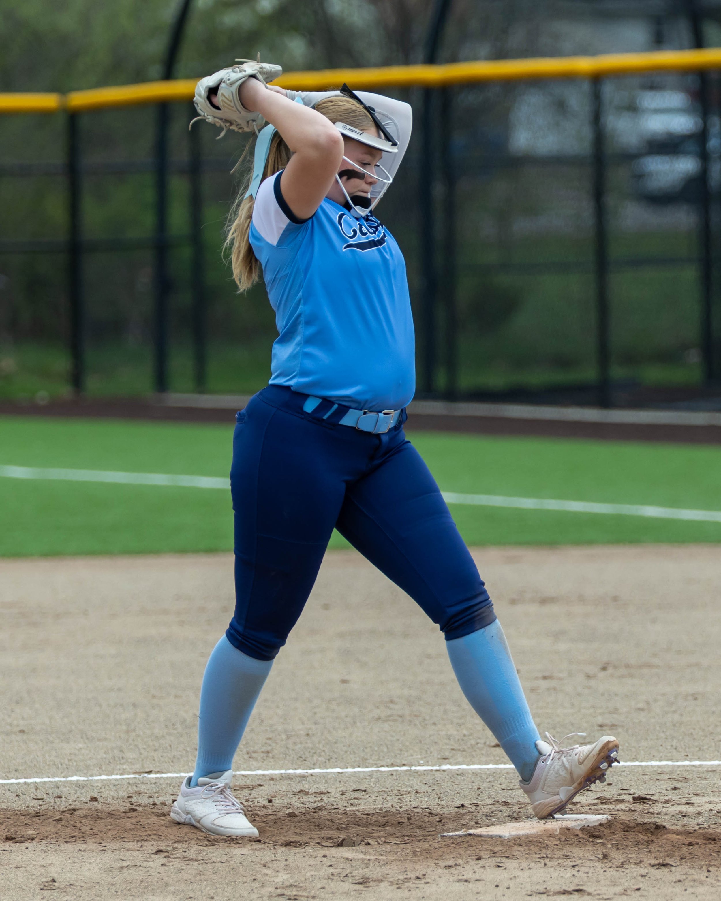 Mott #2 pitcher winds up for the pitch