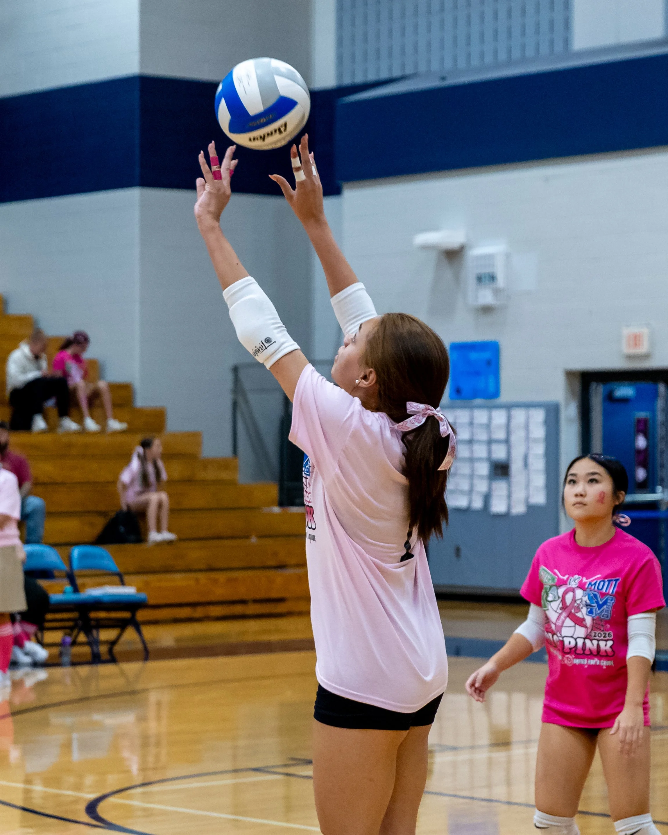 Mott player sets the ball