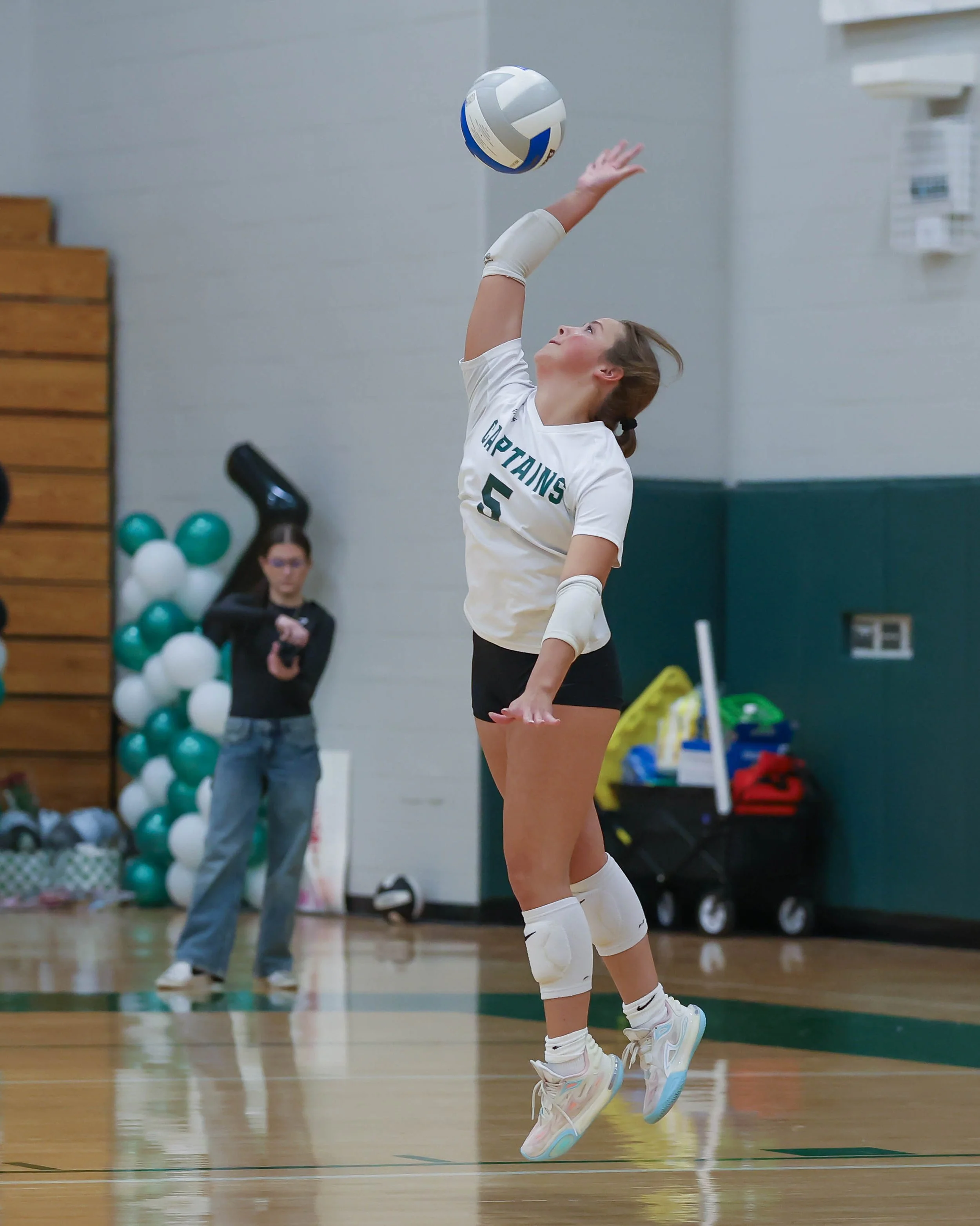 Kettering #5 serves the ball 