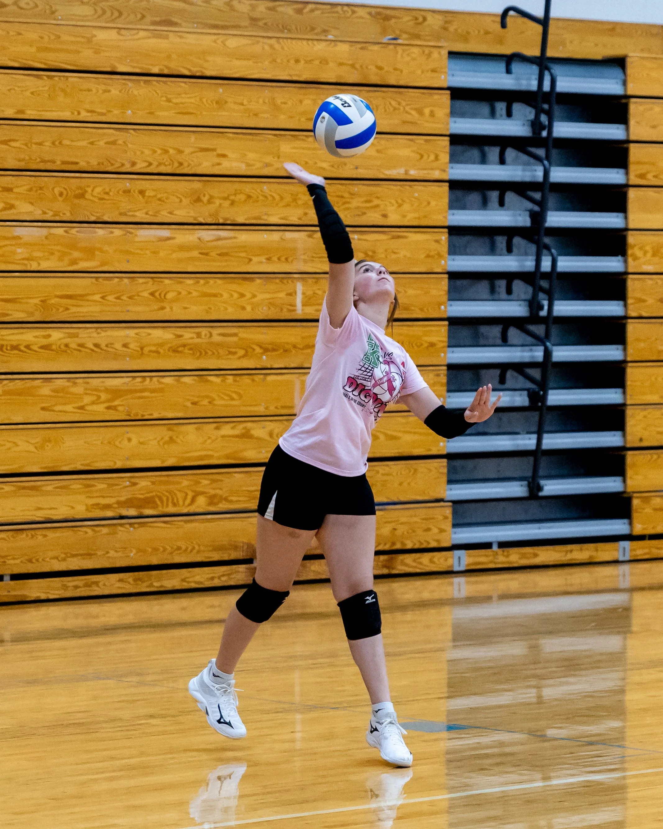 Firebird player serves the ball