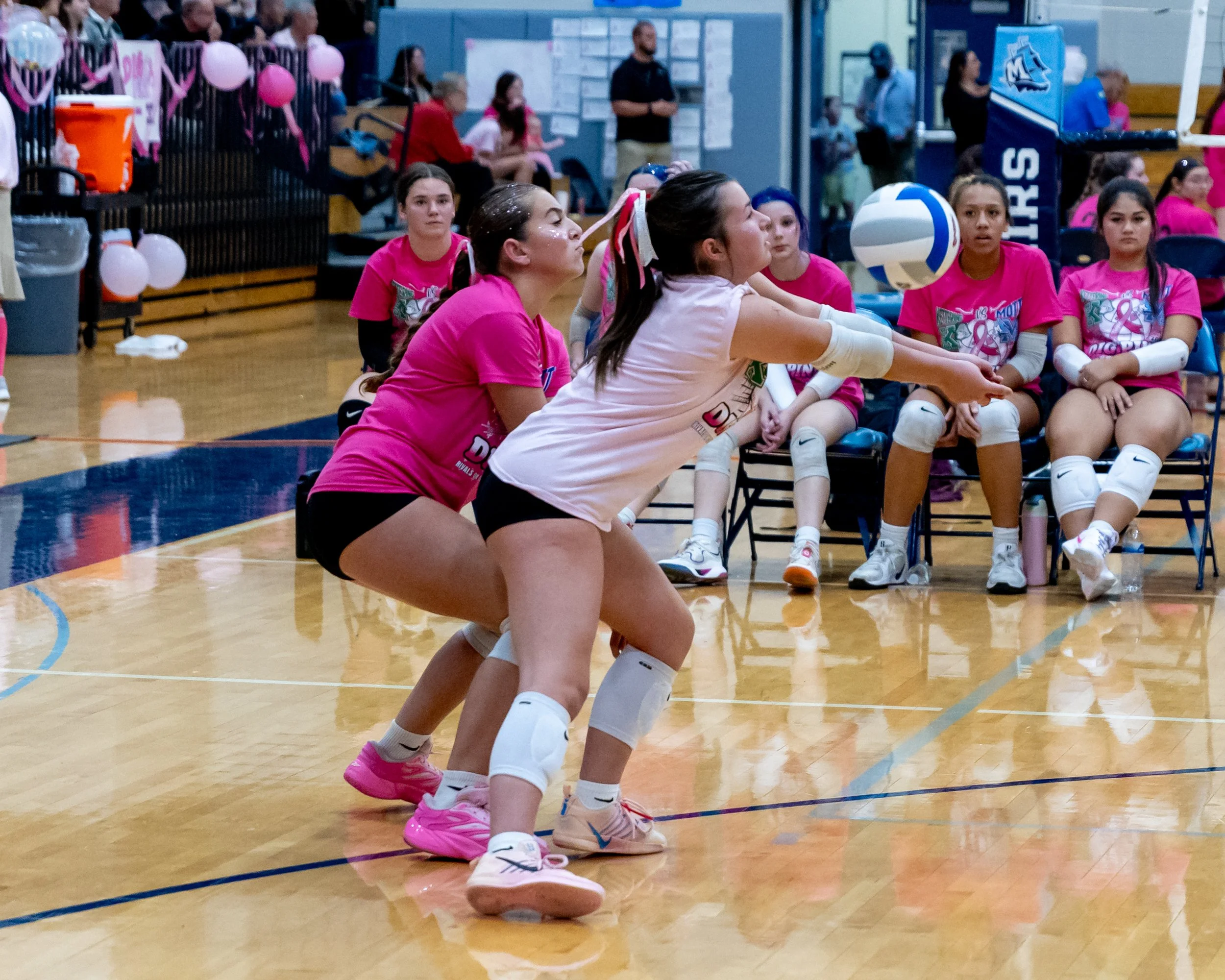 Kettering player hits the ball