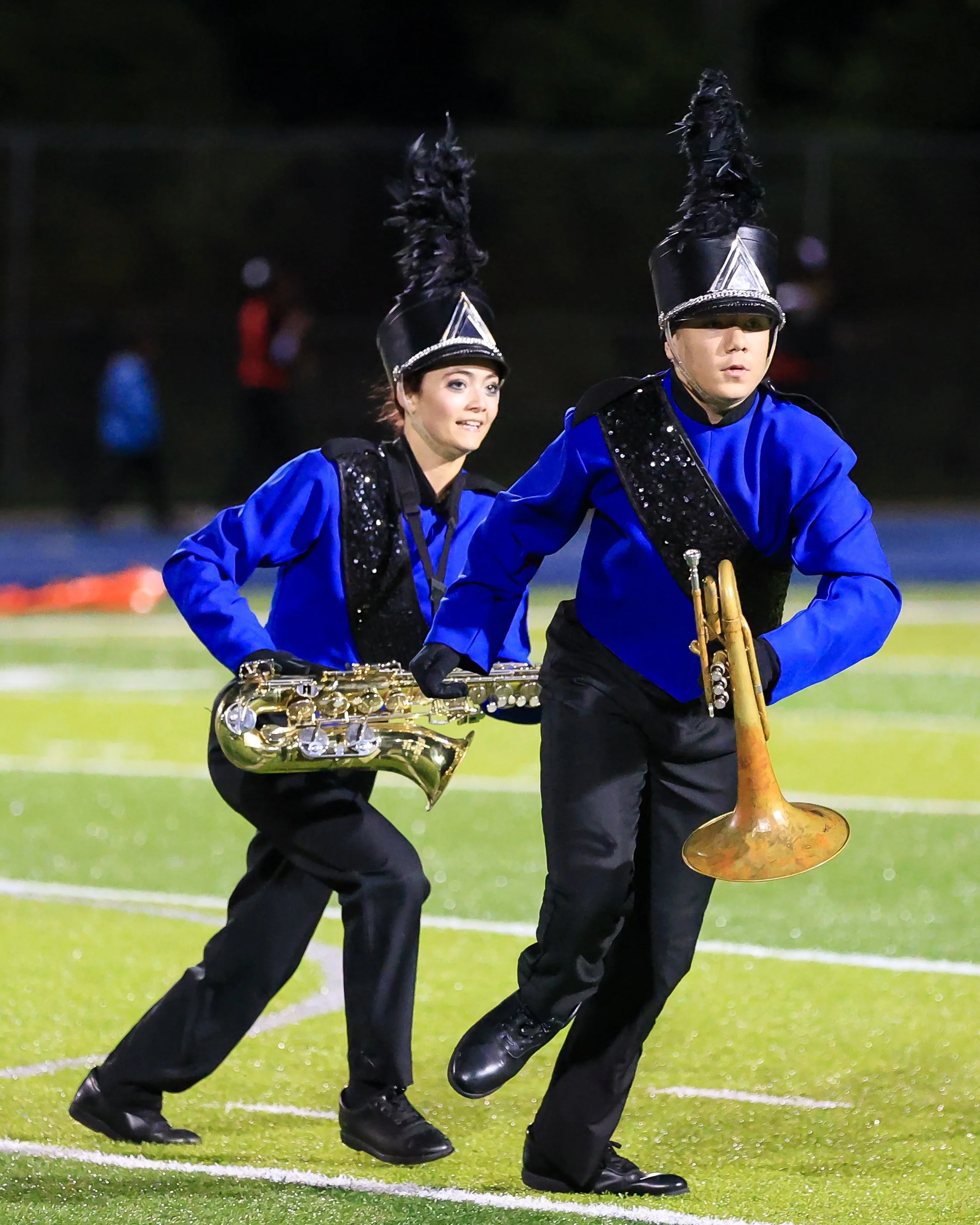 WM Marching Band members running 