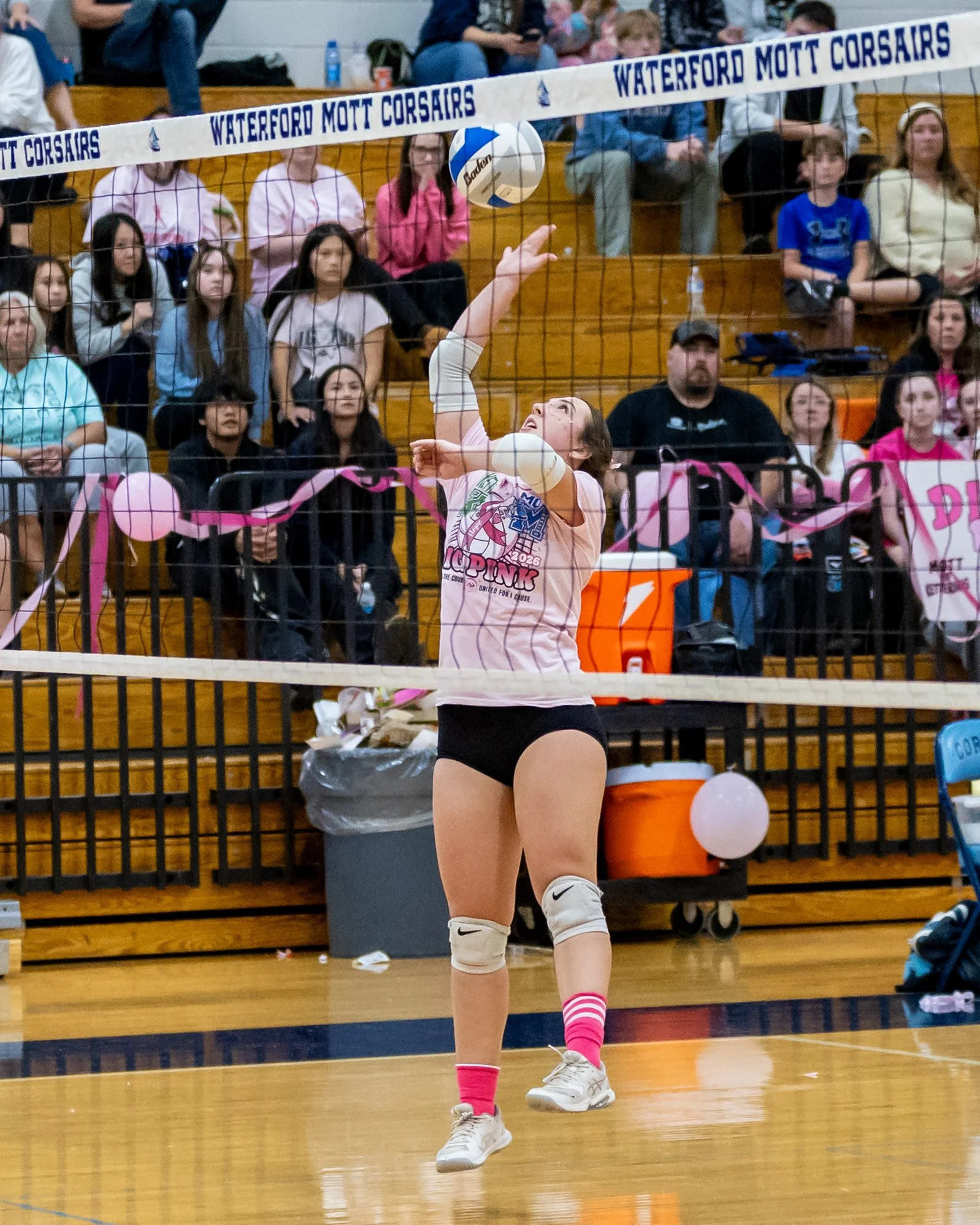 Mott player hits the ball