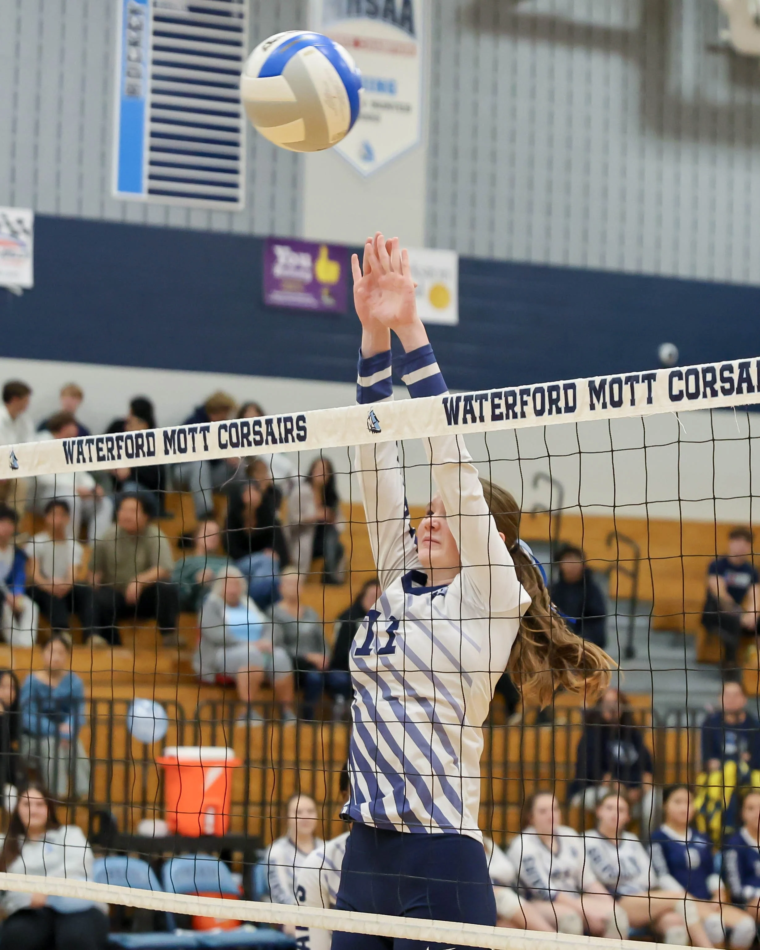Mott #11 up to block the ball