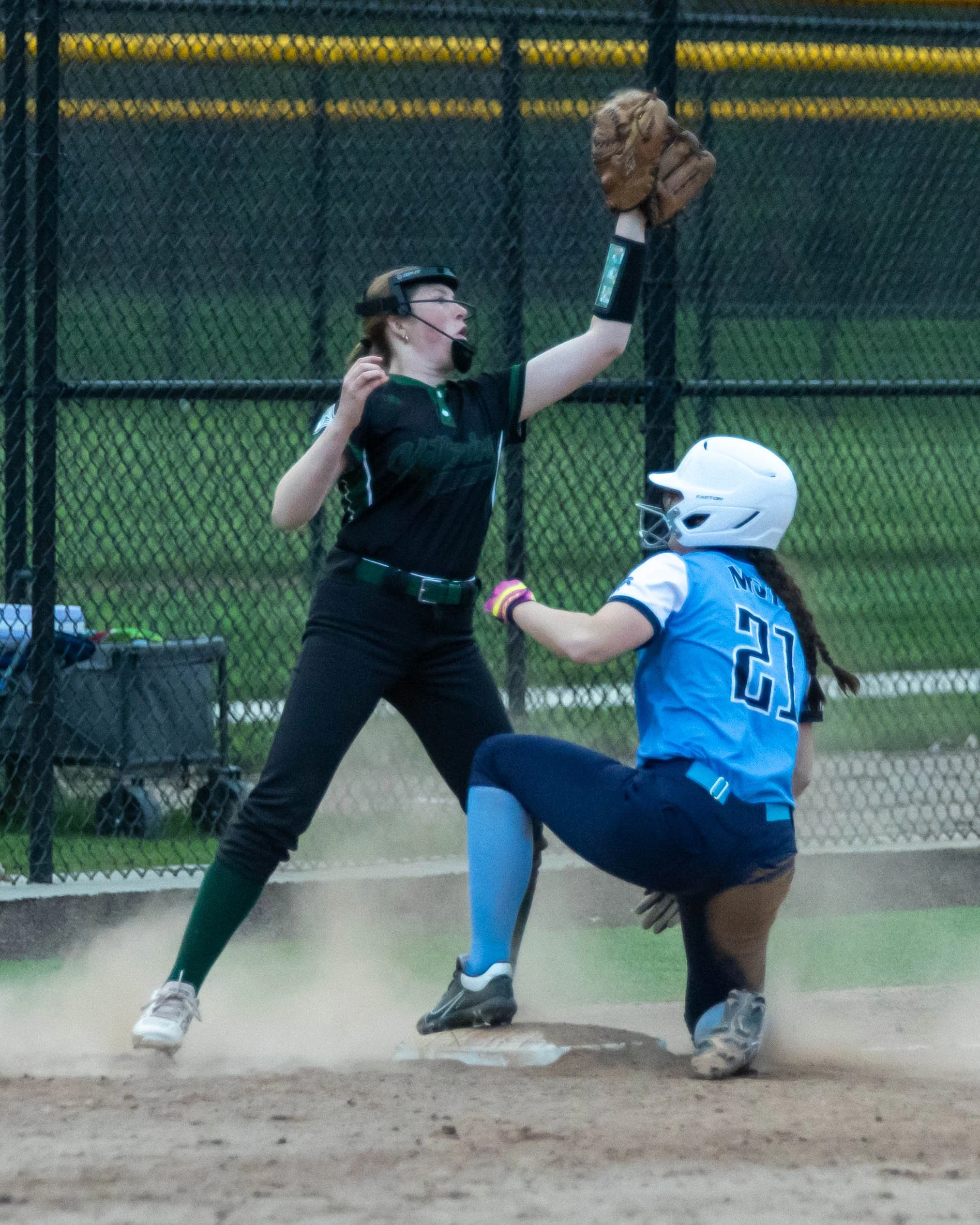 Mott runner slides into third base