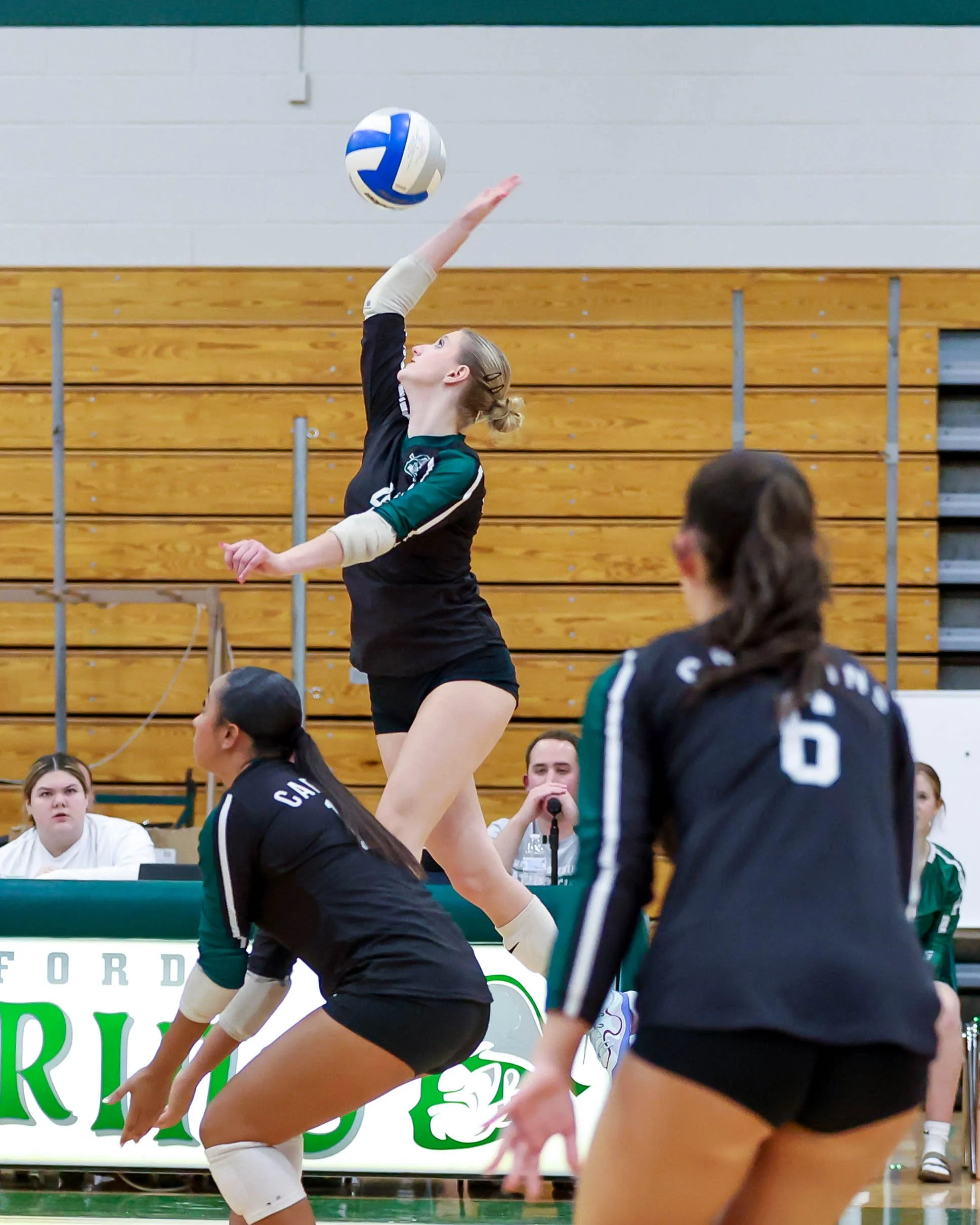Kettering #4 spikes the ball