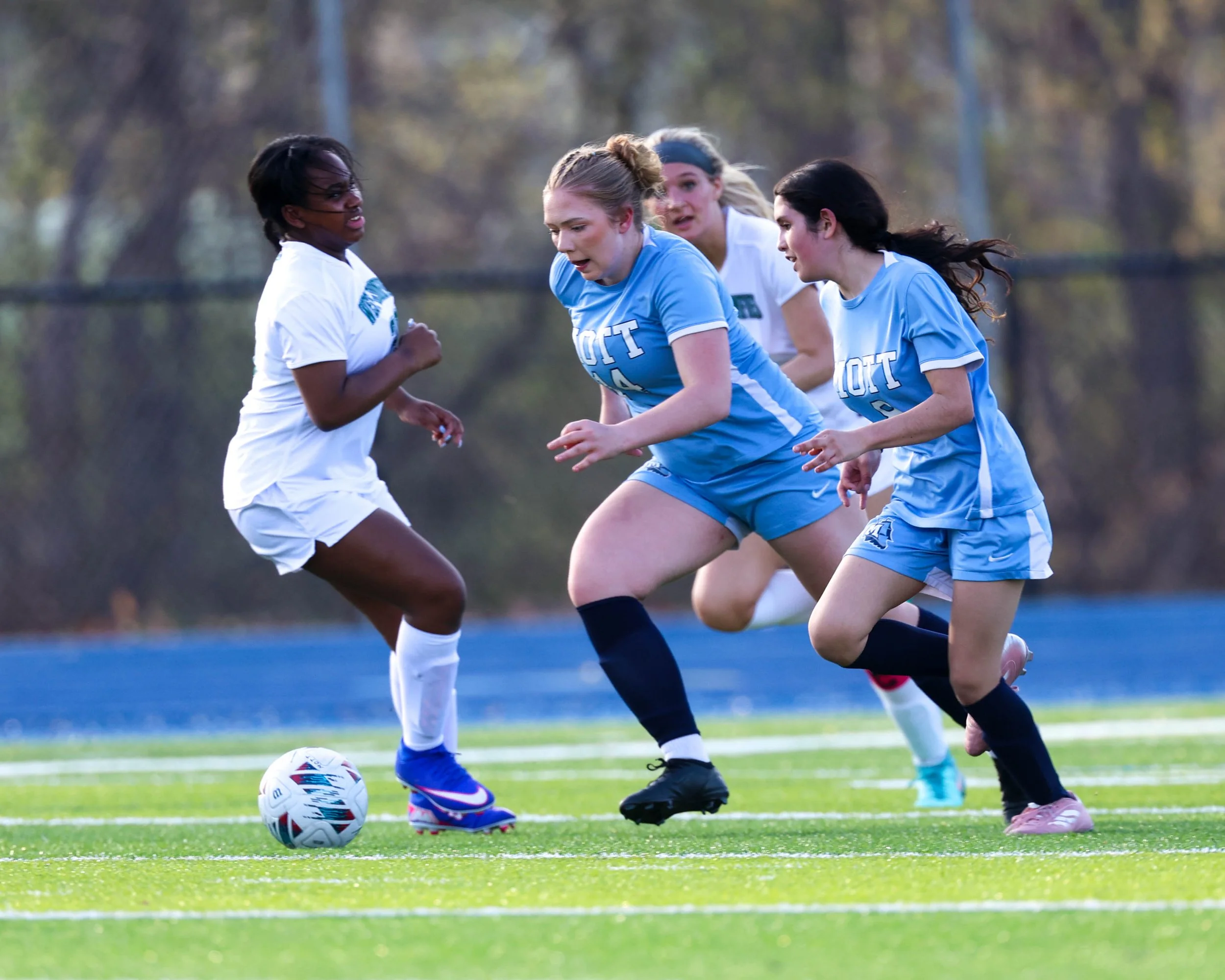 #14 and #8 chase the ball