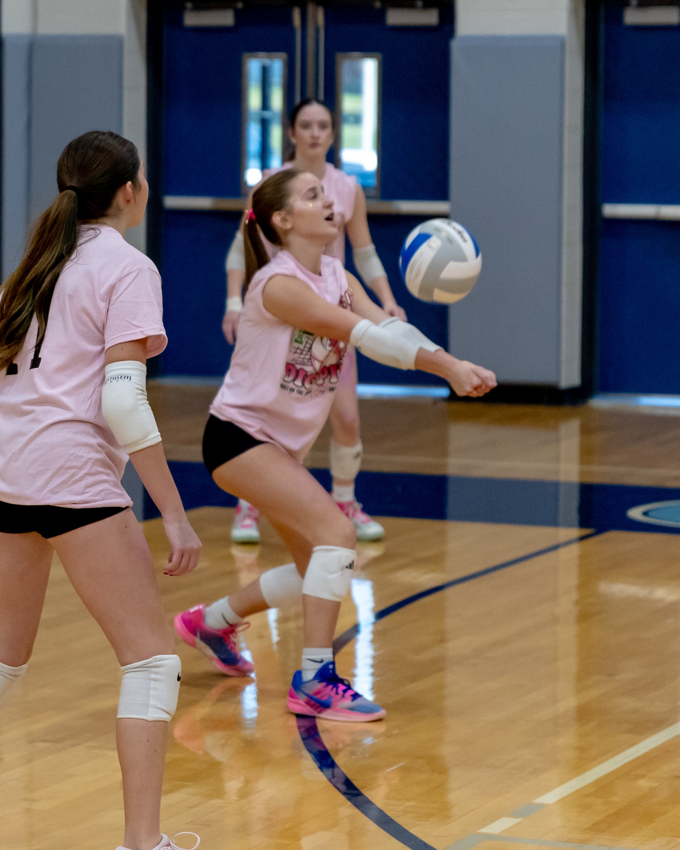 Mason player hits the ball