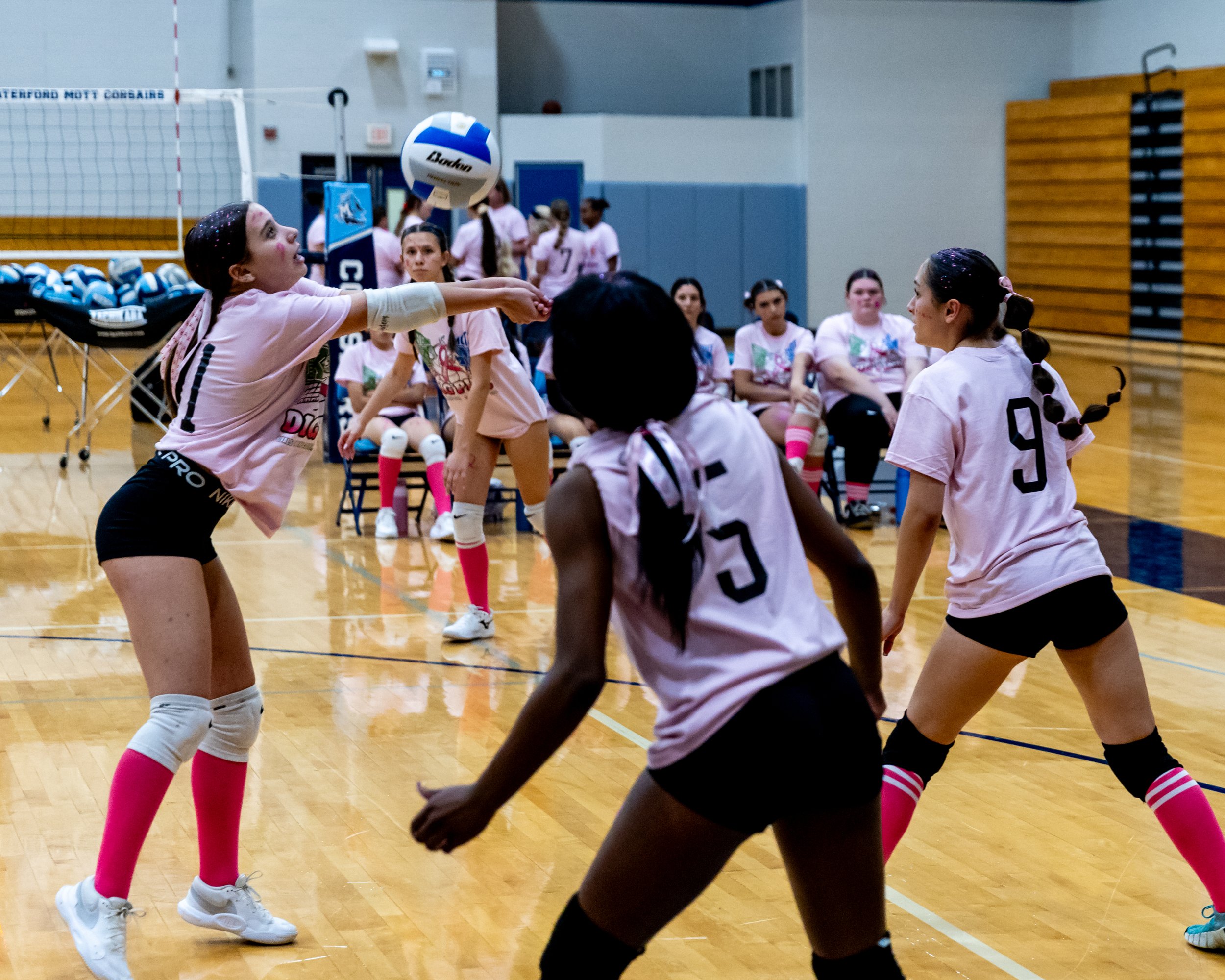 Mott player hits the ball