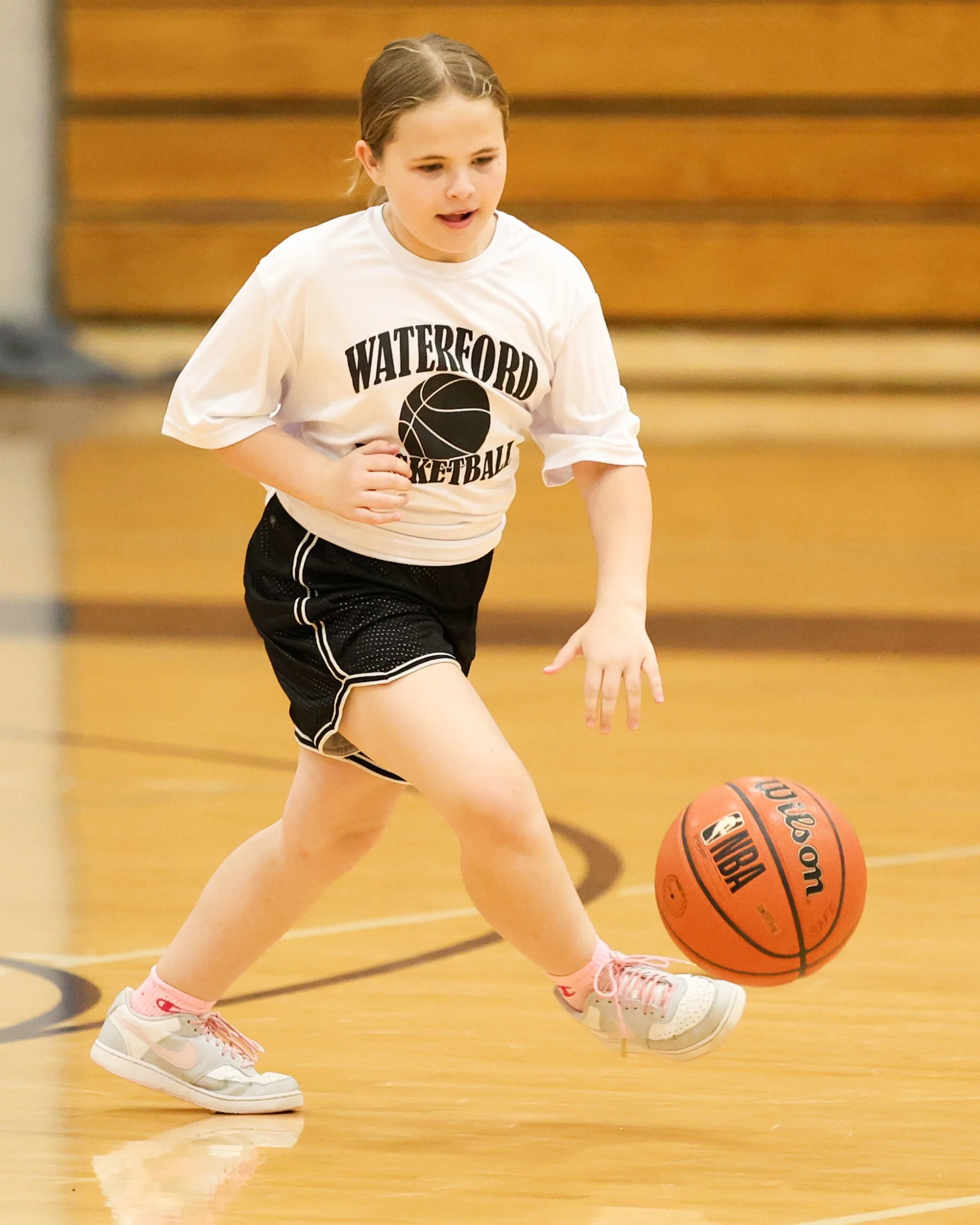 Beaumont girl dribbles the ball