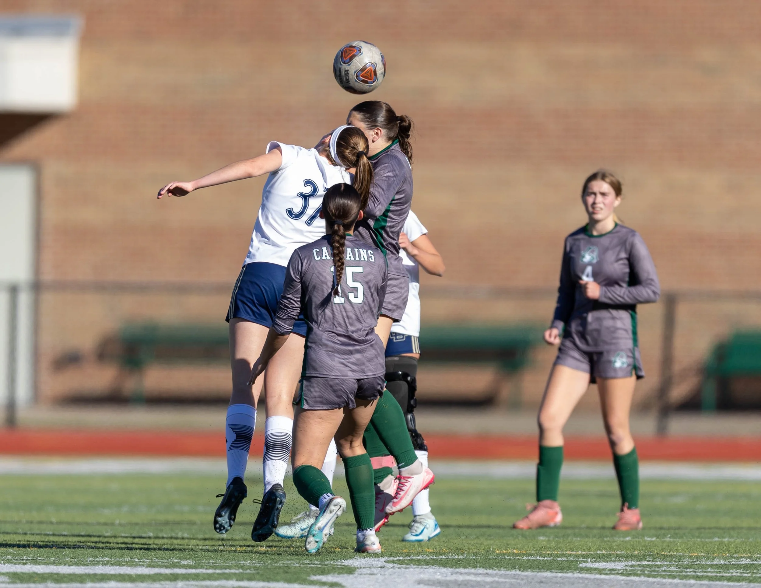 #20 heads the ball 