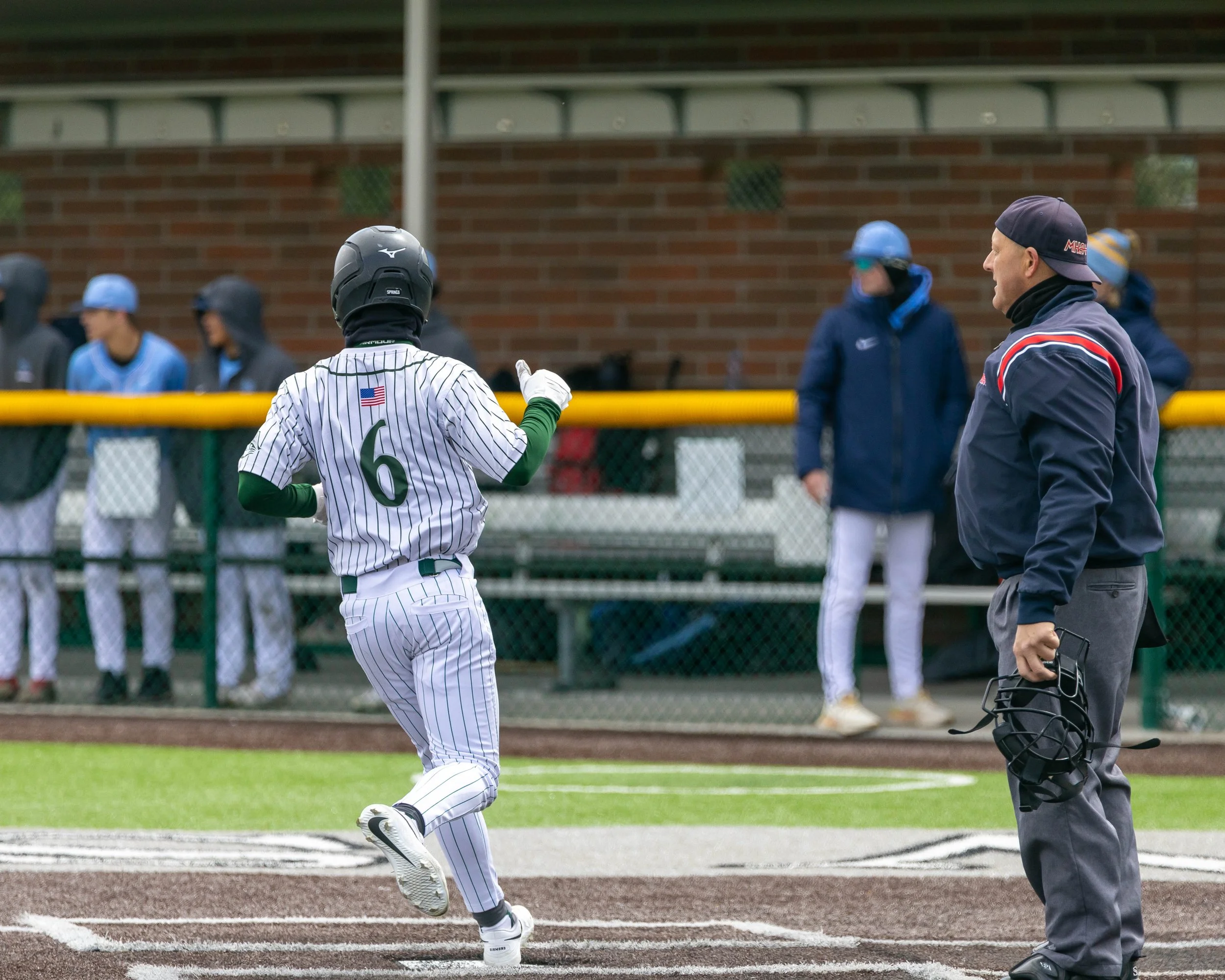 Kettering #6 scores a run