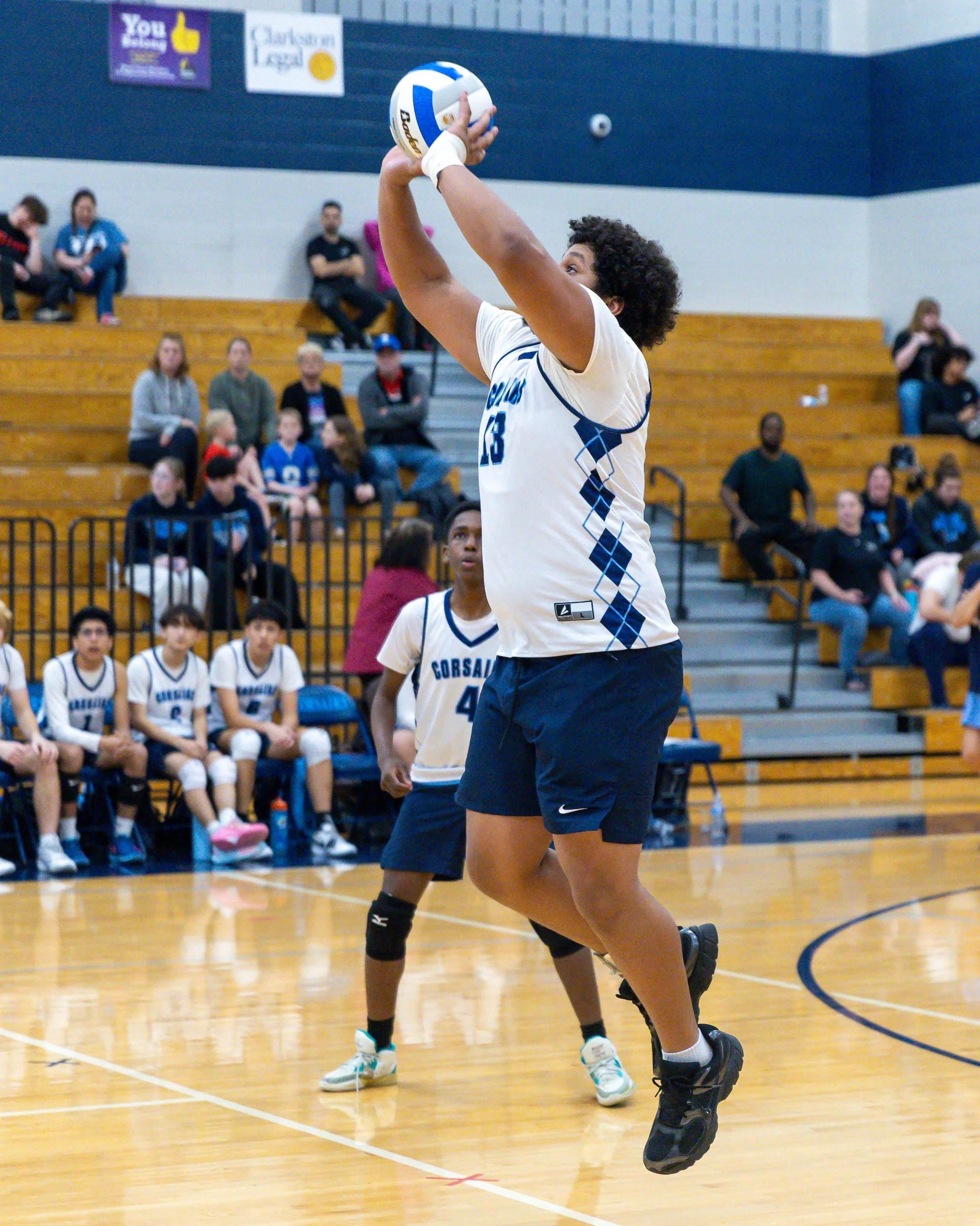 Mott #13 sets the ball