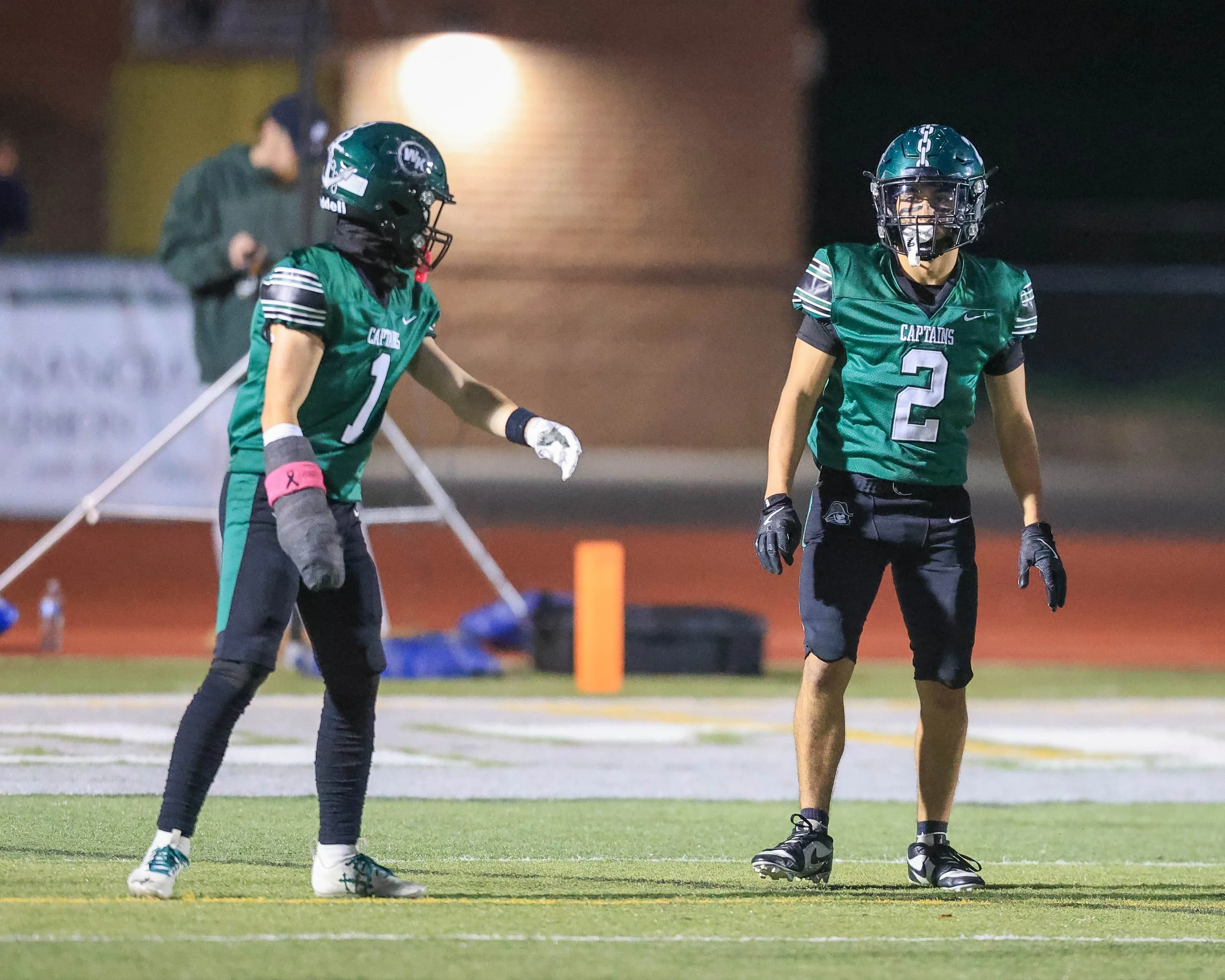 WK #2 and #10 wait for the kickoff