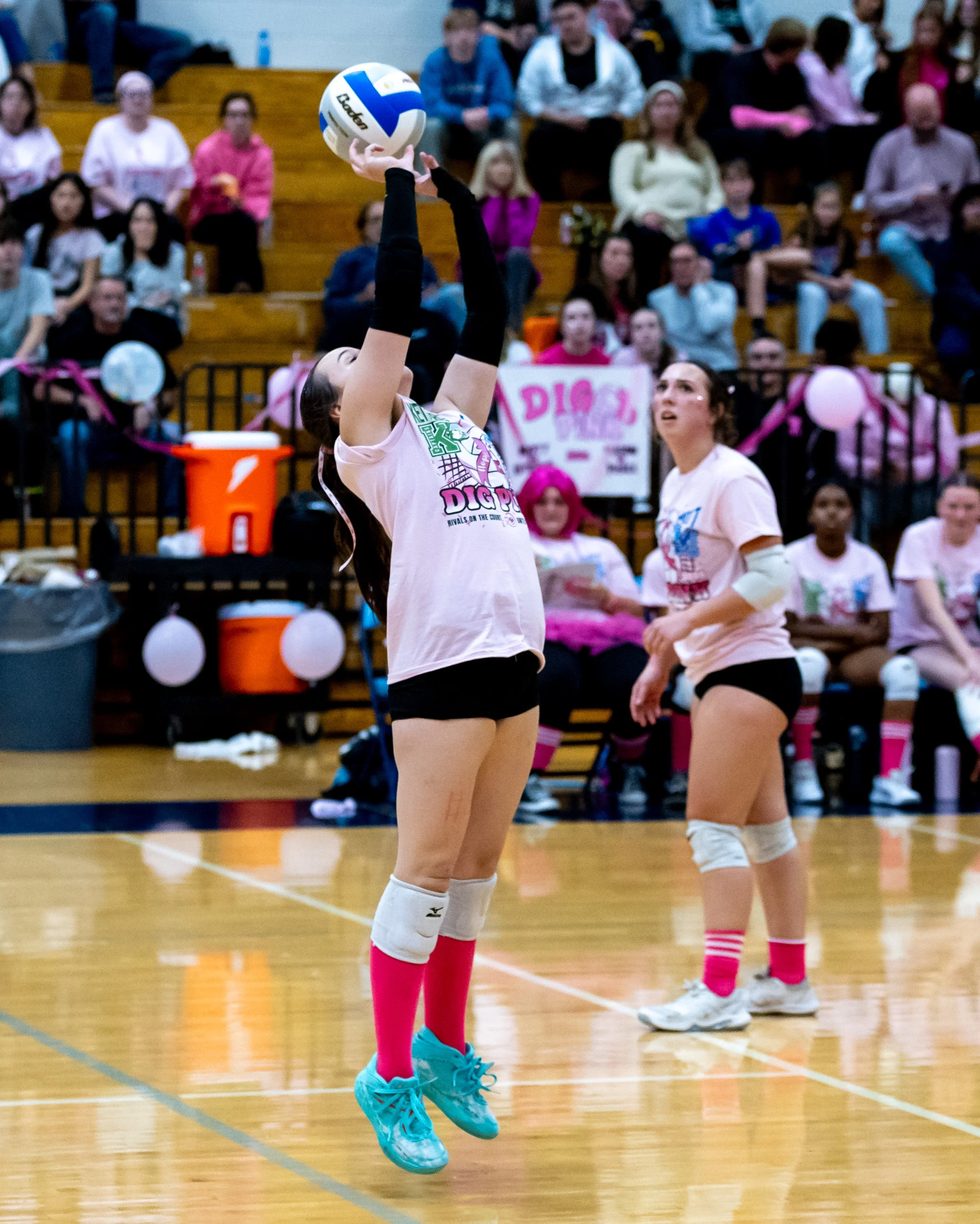 Mott player hits the ball