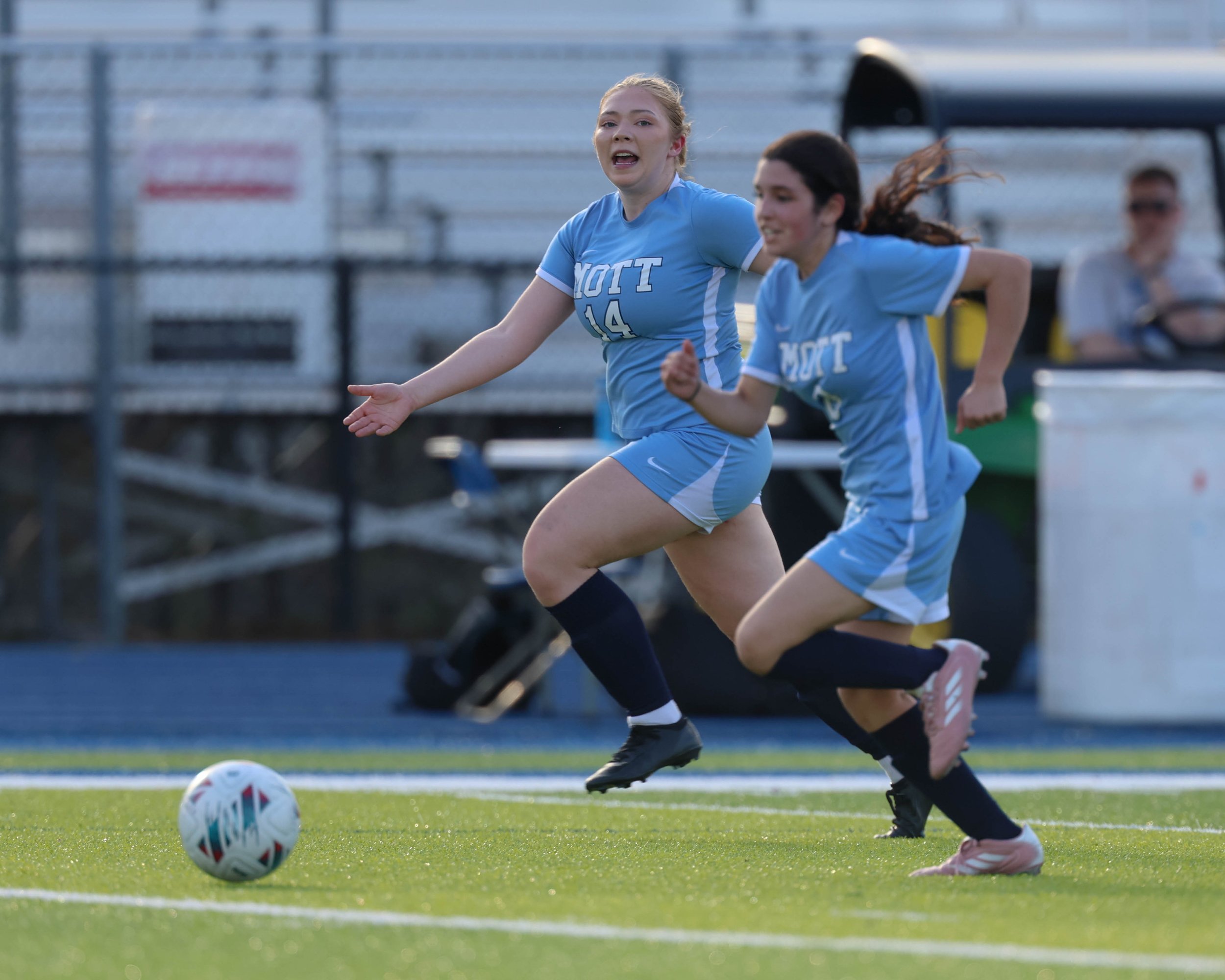 #14 and #8 chase the ball