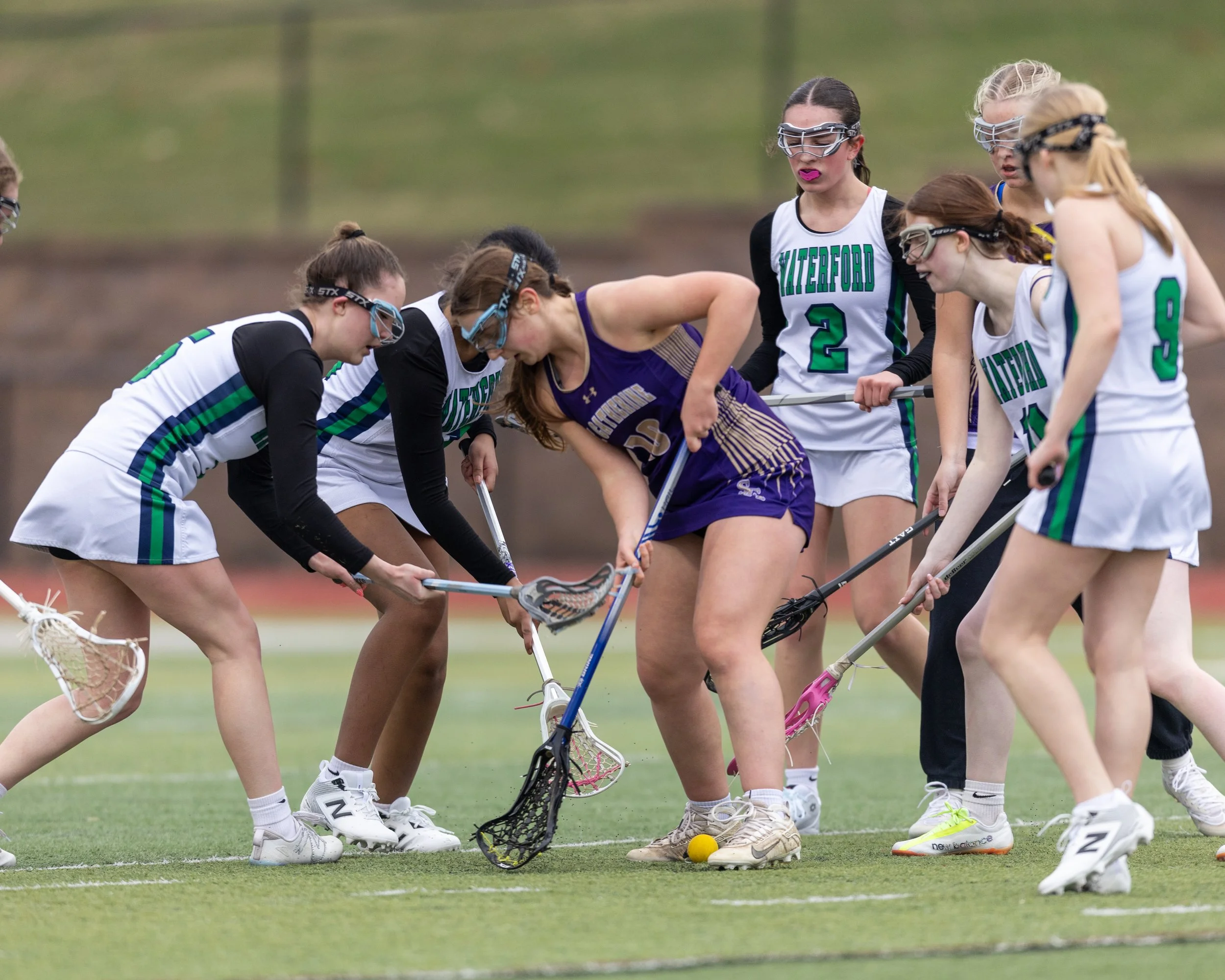 Group of United players around the ball
