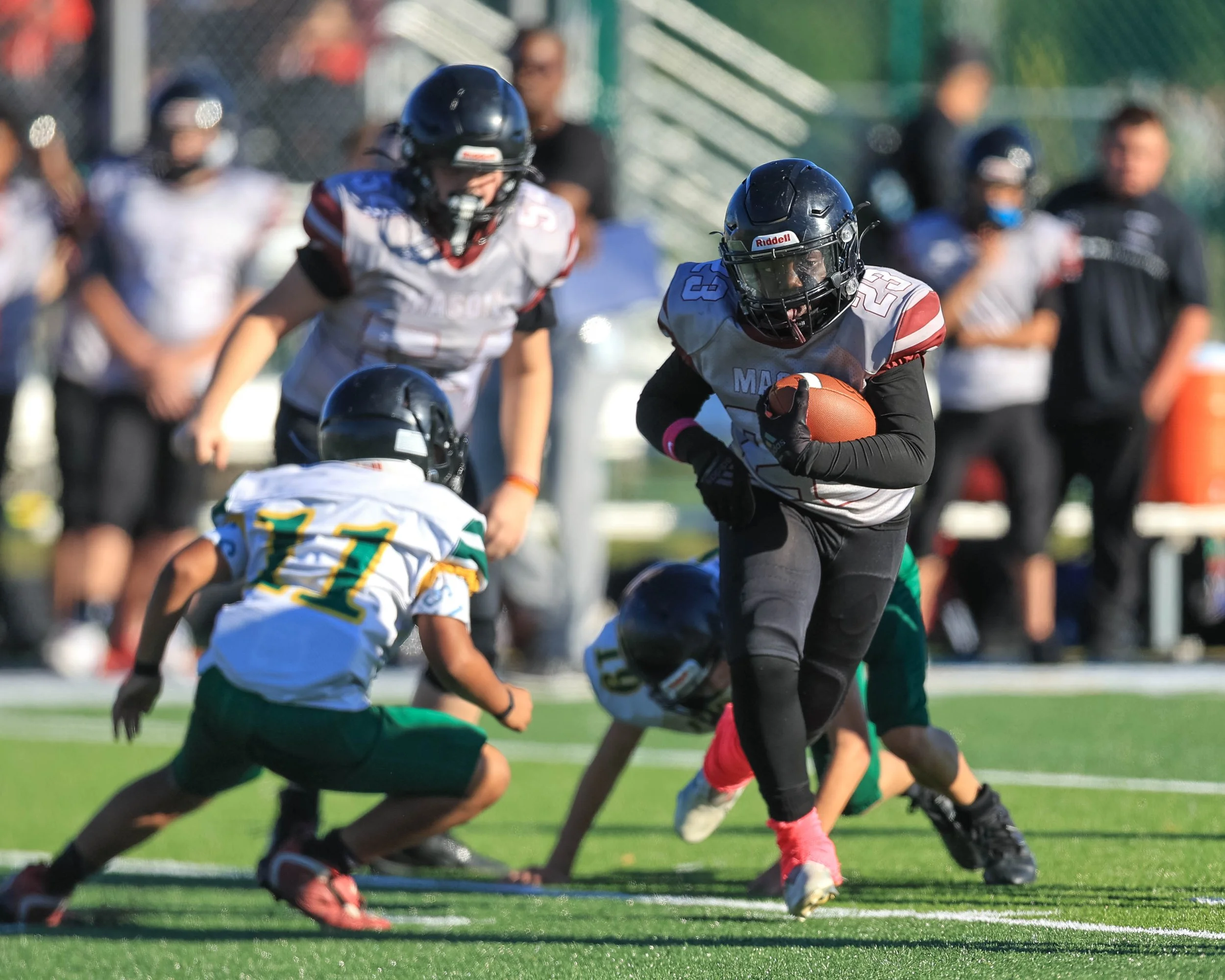 Mason #23 carries the ball