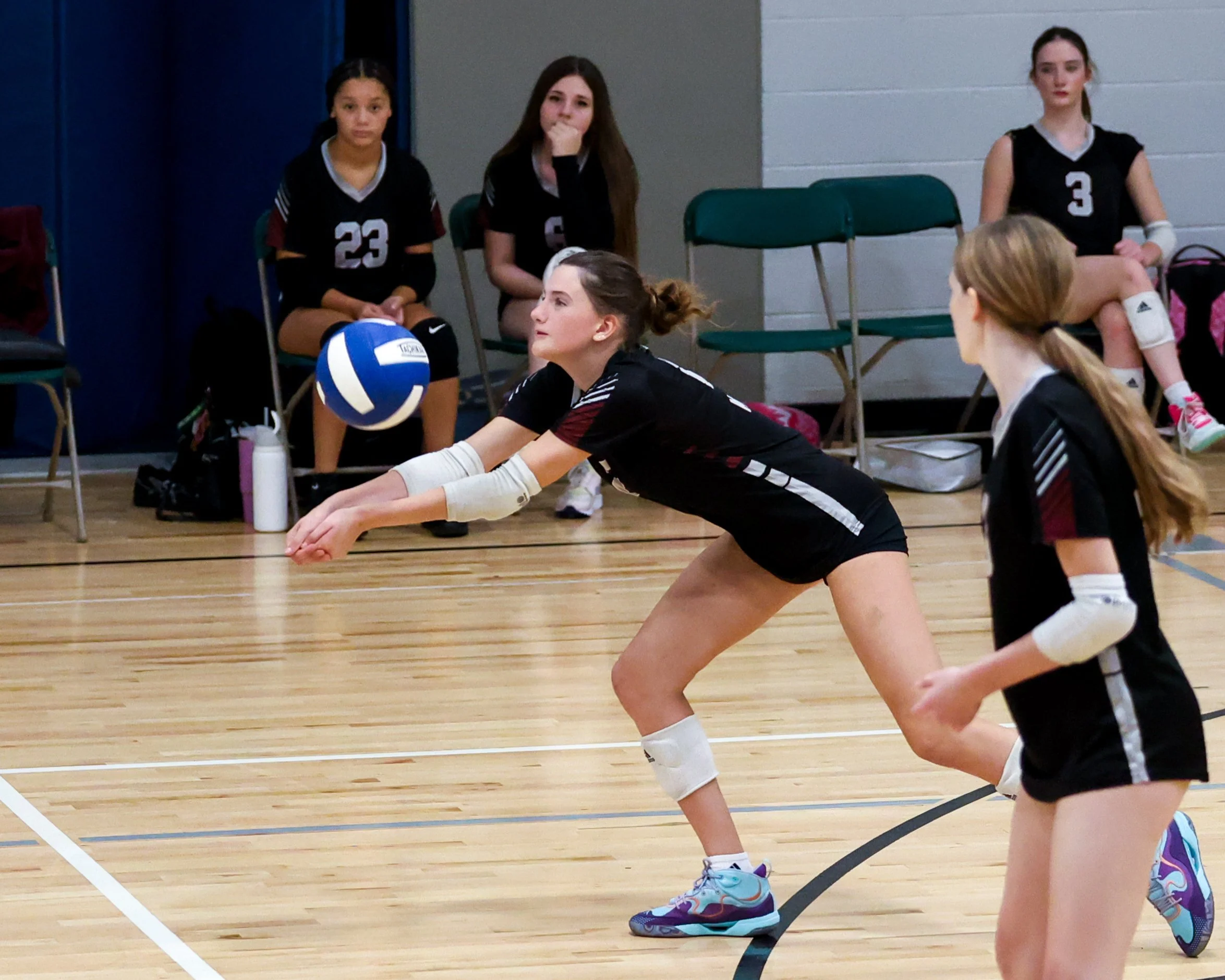 Mason girl returns the ball