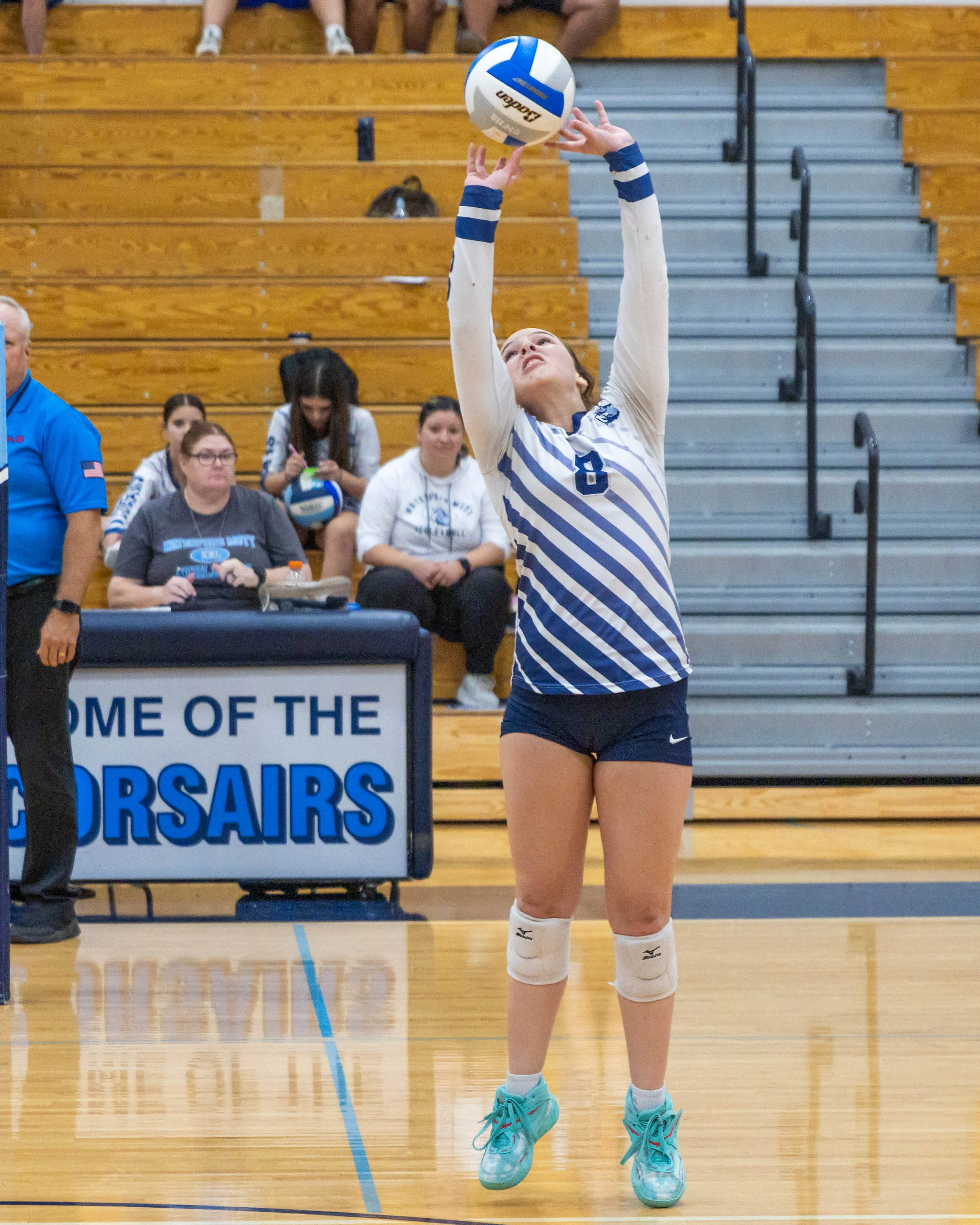 WM #8 serves the ball